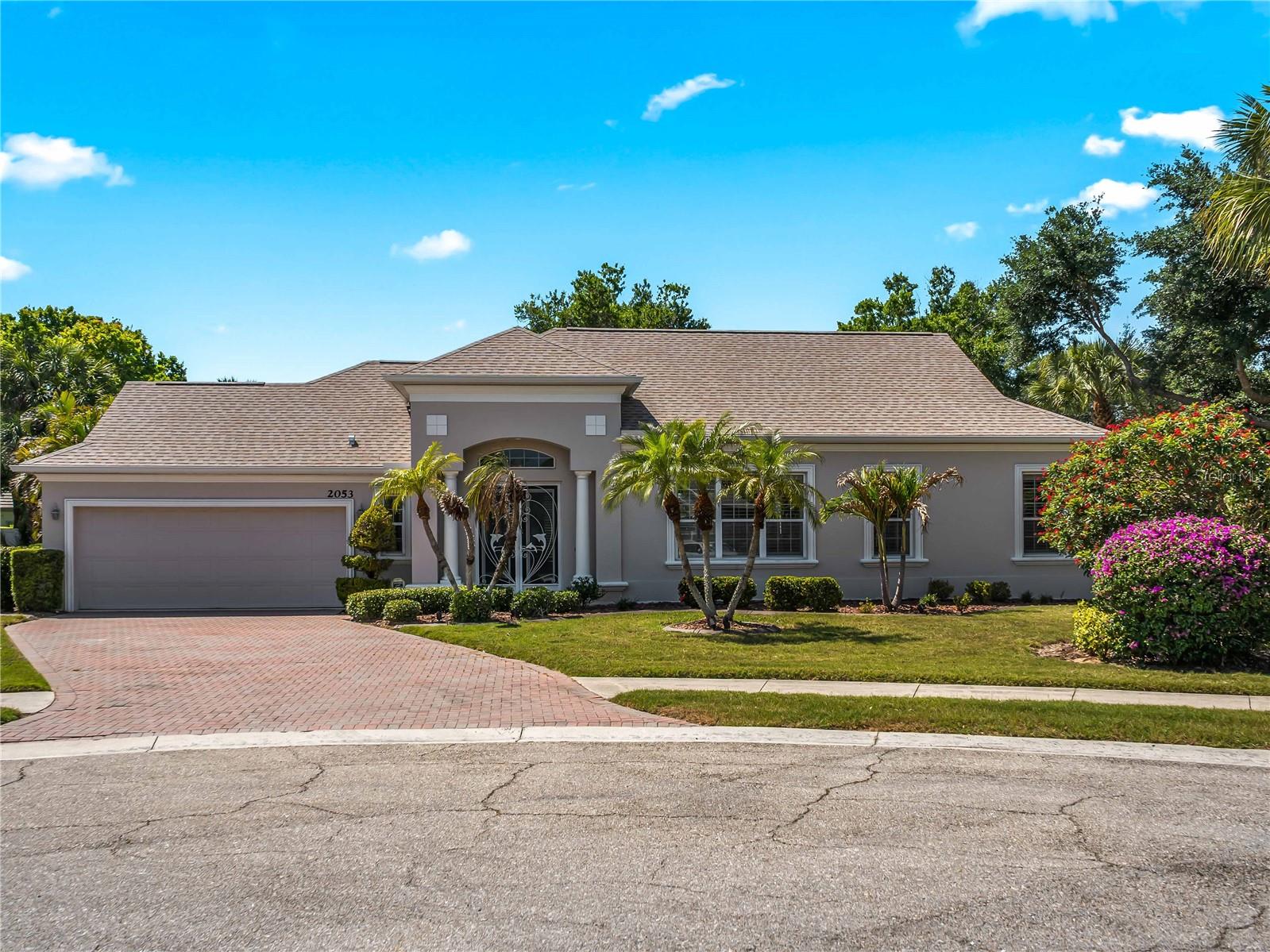 Welcome to 2053 Mattamy Ct., a beautifully maintained 3-bedroom, 2-bath home tucked away in the coveted Enclaves of Venice North. Perfectly positioned on one of the most desirable lots in the community, this property sits on a quiet cul-de-sac, offering added privacy and a peaceful setting.  Inside, the home features a spacious, open layout with soaring high ceilings and abundant natural light throughout. Recent updates include fresh interior and exterior paint, tastefully renovated bathrooms, and classic plantation shutters that add both charm and functionality.  With hurricane windows, plus a newer roof, water heater, and A/C system already in place, you can move in with confidence knowing the major items have been taken care of.  Adding even more peace of mind, the property is not located in a flood zone.
The Enclaves of Venice North is a hidden gem — an intimate community of just 32 homes, giving it a quiet, neighborly feel that’s hard to find. Residents enjoy low HOA fees, no CDD, and access to a well-maintained community pool, perfect for relaxing without the crowds of larger neighborhoods.  Location is another standout feature.  Situated just off Venice Avenue, you’re only minutes from I-75, historic downtown Venice, Venice Beach, and a short drive to Wellen Park for dining, shopping, and entertainment.  If you’re looking for a move-in-ready home in a small, welcoming community with an unbeatable location, this is it — schedule your showing today.