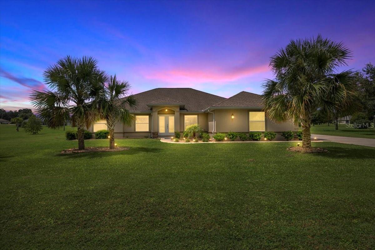 BUYER BONUS!!!!! Up to 2% of the loan amount available as a credit to the buyer toward closing costs, pre-paids, or rate buy-down when using preferred lender. Buyer may choose any lender of their preference. 

This 4-bedroom, 2-bath, 3-car garage home sits on a beautifully cleared and landscaped 1-acre lot and offers a bright, open-concept floor plan ideal for entertaining. The home features stunning granite countertops throughout, white cabinetry, fingerprint-resistant stainless steel appliances, a convection oven, breakfast nook, and large pantry.

The spacious primary suite includes a walk-in closet, dual granite vanities, a garden tub, and a large tiled shower. Triple sliding doors open to a private outdoor oasis with a screen-enclosed saltwater pool, expansive paver patio with firepit, and peaceful backyard views.

A unique feature is the authentic Chickee hut, handcrafted on-site by a Seminole elder using solid cypress poles and palm frond thatching. Conveniently located near Inverness and Crystal River with access to Rails-to-Trails, boating, fishing, Rainbow River, and the Gulf of Mexico. 2021 Roof, 2021 HVAC, 2021 Hot Water Heater.