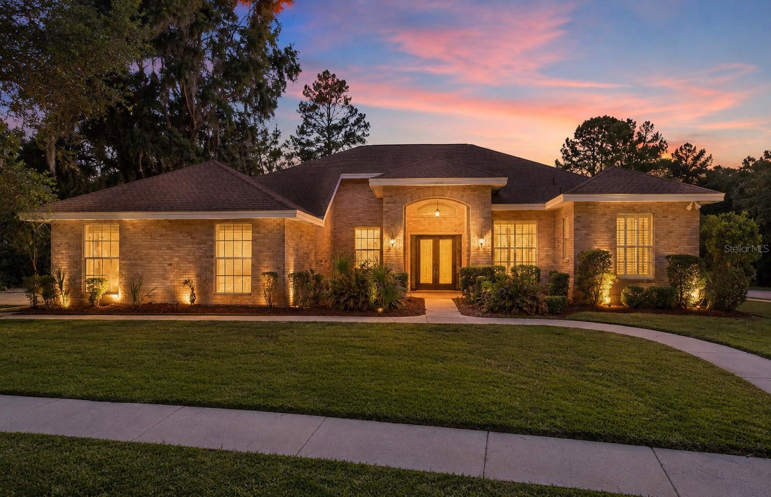 You Will Never Find a Location Like This -- GUARD-GATED. CUL-DE-SAC. Steps to the WEEKI WACHEE RIVER!!

There are good locations. There are great locations. And then there's this location.

Behind a GUARDED GATE, all the way to the back of an exclusive estate community, on a CORNER LOT at the end of a CUL-DE-SAC -- and a 3-minute walk from your backyard sits a PRIVATE COMMUNITY PARK with DIRECT RIVER ACCESS to the WORLD-FAMOUS WEEKI WACHEE RIVER. Grab your kayaks and paddleboards because this is the kind of access people spend years searching for and never find. Tennis, Basketball, and Pickleball Courts round out the amenities, but let's be honest, the river is the star. 

The home opens with a GRAND DOUBLE LED GLASS ENTRY, CEDAR WOOD SIDING, and a BRICK FRONT that turns heads before you even pull into the 3-CAR SIDE-ENTRY GARAGE. Inside, GRAND COLUMNS frame the FORMAL LIVING and DINING AREAS with HARDWOOD FLOORS and TRIPLE SLIDING GLASS DOORS overlooking the pool. A private HOME OFFICE with BUILT-INS and WAINSCOTING sits behind DOUBLE GLASS DOORS. The primary suite features HIS AND HERS WALK-IN CLOSETS and a spa-like bathroom with a SOAKING TUB and WALK-IN SHOWER. 

The RENOVATED KITCHEN showcases STUNNING GRANITE COUNTERTOPS, a COOKTOP and WALL OVEN, and NEW APPLIANCES (2019). And then there's the FAMILY ROOM. We're not exaggerating when we say it feels like a GRAND BALLROOM -- SOARING CEILINGS, FLOOR-TO-CEILING WINDOWS flooding the space with natural light, a WET BAR, and an ELECTRIC FIREPLACE. This is the room people walk into and don't want to leave. The SPLIT BEDROOM PLAN offers two guest rooms with a shared bath plus a PRIVATE GUEST SUITE at the rear of the home. 

Outside, a TONGUE AND GROOVE CEDAR CEILING sets the scene over freshly sealed BRICK PAVER DECKING, a HEATED SALTWATER POOL AND SPA with an IN-FLOOR CLEANING SYSTEM, an OUTDOOR KITCHEN with a NEW JENN-AIR GRILL, and an OUTDOOR SHOWER with hot and cold water. 

NEW ROOF (2017). NEWER HOT WATER HEATER. NEWER POOL PUMP AND FILTER. IRRIGATION WELL. NO FLOOD ZONE, NO CDD!
3,492 SF OF LIVING SPACE. 4,923 SF UNDER ROOF. One location you will never find again.