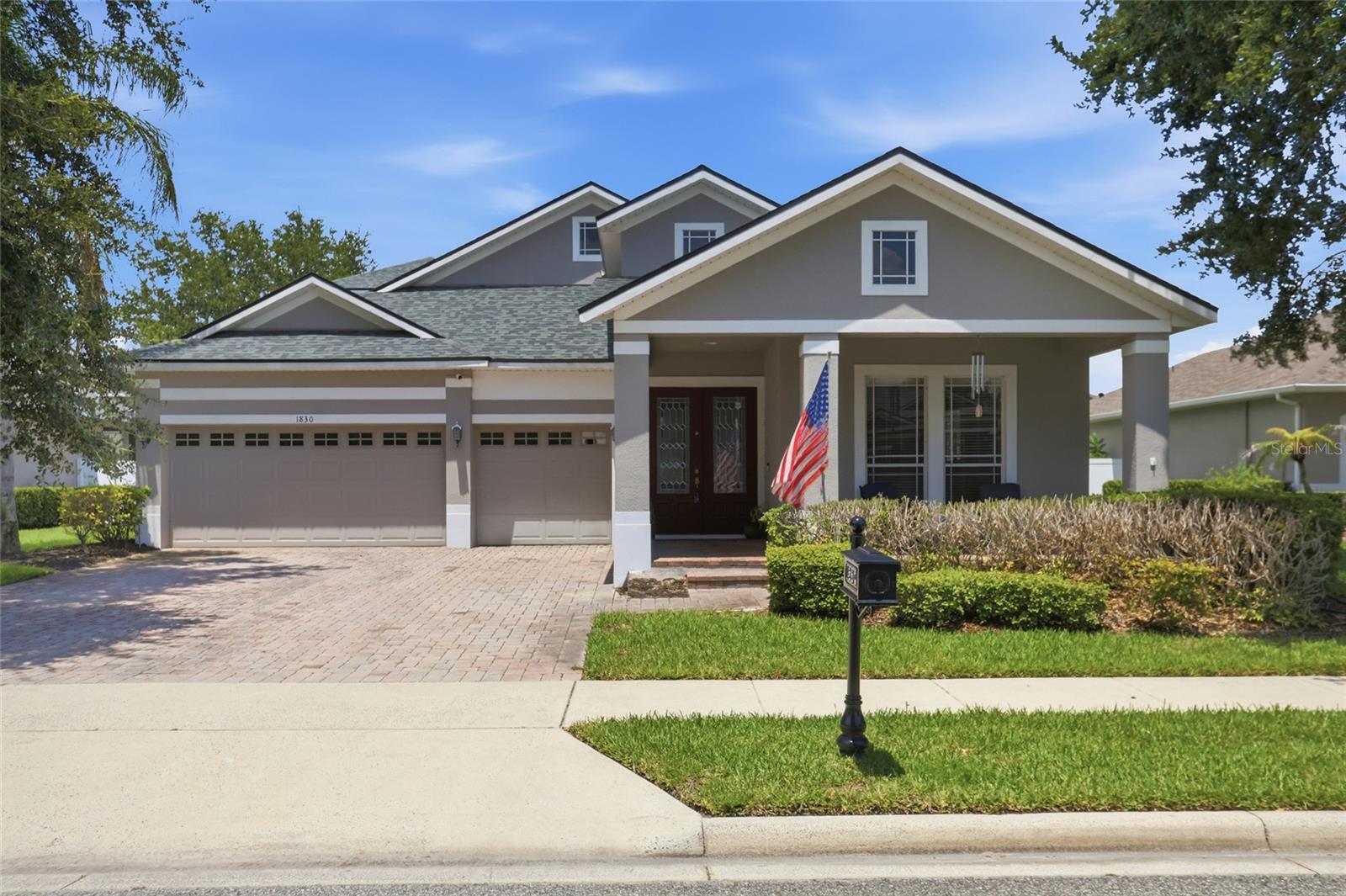 Virtually Staged. Lender Credit of 1% (of loan amount) toward closing costs or rate buy-down (inquire for more info). Welcome to CARRIAGE POINT, a GATED Winter Garden community offering an exceptional location and a thoughtfully designed floor plan. This two-story POOL home delivers the space today’s buyers crave, room for everyone, from dedicated home offices to flexible living and guest areas. With 3,435 square feet of living space, this home features five bedrooms, four full bathrooms, and a large bonus room.

As you enter the home, you are welcomed by a spacious living room and dining room before continuing into the heart of the home. The open-concept kitchen features granite countertops, 42-inch cabinetry with crown molding, under-cabinet lighting, a gas range, an expanded pantry, and plenty of space for a breakfast table. The kitchen opens to the family room with sliding doors leading out to the SCREENED-IN POOL and FENCED backyard.

The first floor features a desirable three-way split floor plan with four bedrooms and three full bathrooms. The spacious downstairs primary suite offers plenty of room to relax, along with a walk-in closet and private en-suite bathroom. 

Upstairs provides even more flexibility with a fifth bedroom, fourth full bathroom, and a large living area. Newer luxury vinyl plank flooring extends throughout the upstairs and staircase.

The outdoor living space is a true highlight of this home with an expansive screened-in SALT WATER POOL ADDED IN 2021. Designed with both relaxation and fitness in mind, the pool features water jets giving a swim-against-the-current feature, creating the perfect space to enjoy a refreshing swim or get in a low-impact workout.

Carriage Pointe offers residents a variety of community amenities including a tennis court, playground, soccer field, and walking path. For those who enjoy an active lifestyle, the area offers miles of scenic trails, including the West Orange Trail, along with parks and outdoor activities nearby. The location is ideal, with convenient access to State Road 429 and Highway 50, making travel throughout Central Florida easy. Enjoy being close to Winter Garden Village, the Hamlin area, restaurants, shopping, entertainment, and AdventHealth Winter Garden.

Families will appreciate the HIGHLY RATED SCHOOLS, including Whispering Oak Elementary, Hamlin Middle School, and West Orange High School. Historic Downtown Winter Garden is less than five miles away and offers charming shops, local restaurants, the weekly farmers market, the West Orange Trail, and year-round community events.

Additional features include a three-car garage, natural gas service through Lake Apopka Natural Gas District, gas washer and dryer, a 2020 water heater, updated electrical service, and added electrical for a built-in microwave.

With its exceptional floor plan, private pool, flexible living spaces, and prime Winter Garden location, this Carriage Pointe home offers exceptional space, comfort, and convenience. Schedule your private tour today!