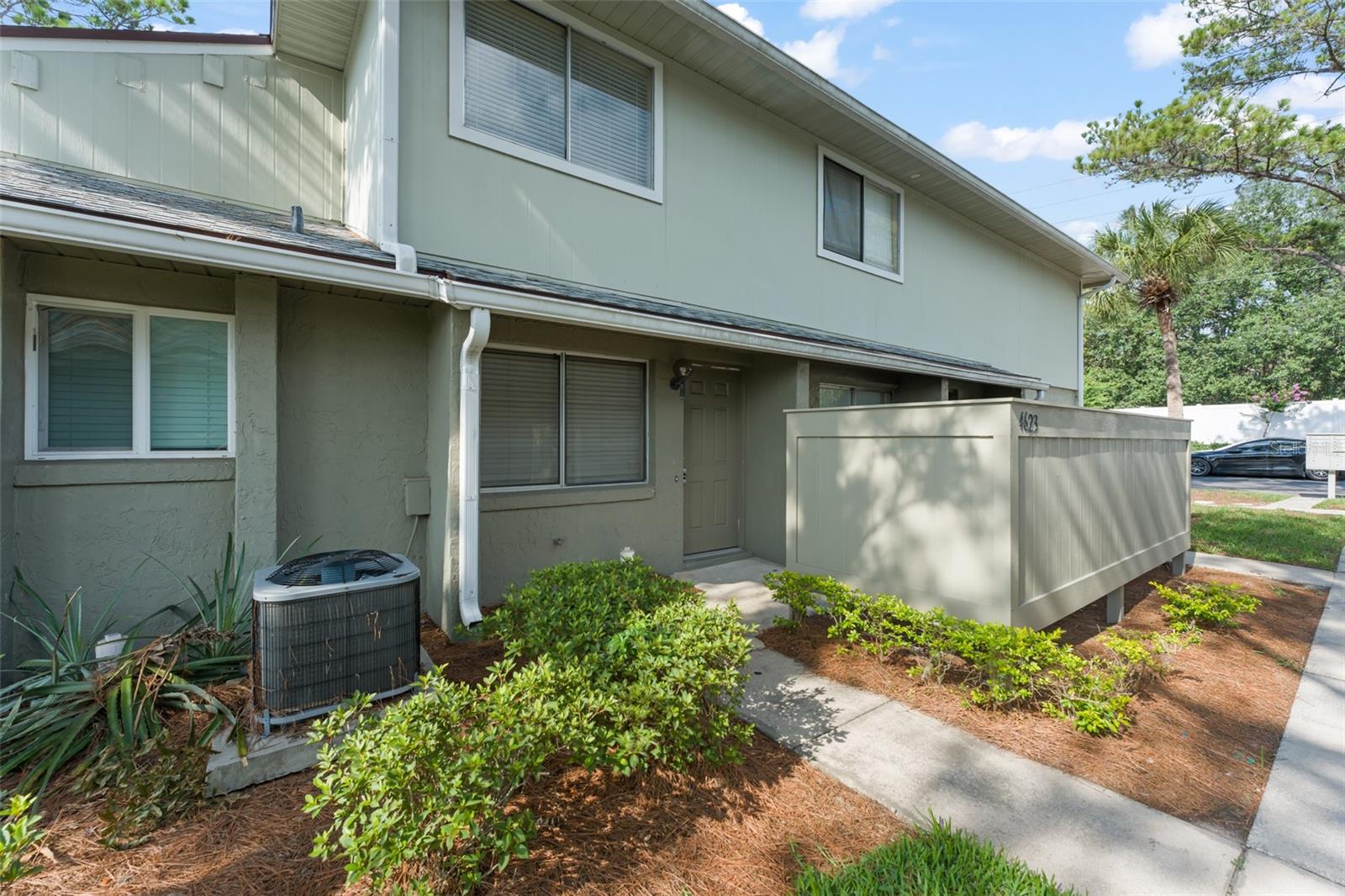 Whether you're looking for a primary residence or an investment opportunity, this well-maintained 2-bedroom, 1.5-bath split-level condominium offers comfort, convenience, and low-maintenance living in a quiet, centrally located golf community. The functional split-level floor plan provides spacious living and dining areas on the main level, while both bedrooms are privately situated upstairs. The kitchen features ample cabinet space, a breakfast nook, a pass-through window to the living area, and a full appliance package. Ceramic tile flooring in the kitchen and bathrooms, and carpet throughout the living areas, create a warm and inviting feel. A one-car attached garage provides added convenience and extra storage space. HOA dues (to be verified by buyer) include exterior building maintenance, grounds maintenance, building insurance, trash service, and roof maintenance, allowing you to enjoy easy, low-maintenance living in a desirable location.