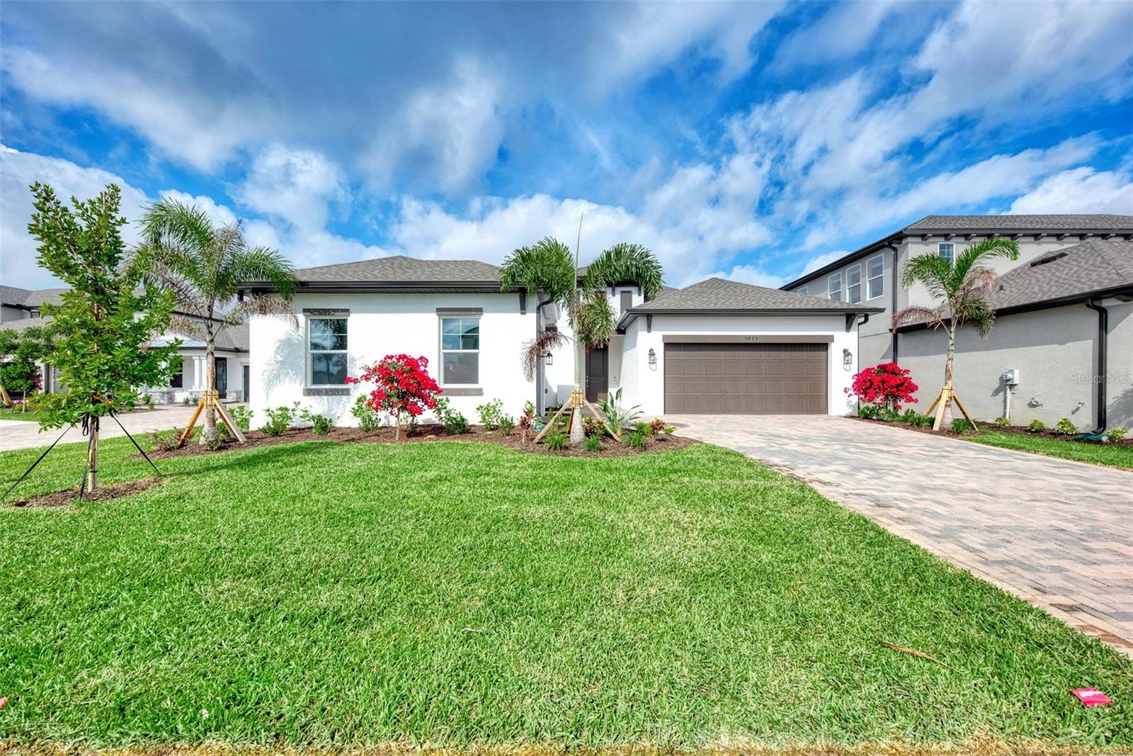 AVAILABLE NOW AND WAITING JUST FOR YOU is this new Luxury Builder M/I Homes single family 4 bedroom/3 bath/3 garage home located in South Sarasota in the new gated community Promenade Estates in Palmer Ranch. This home offers a large open space with ceramic tile throughout the house, tray ceilings and canned lighting. The Gourmet Kitchen is equipped with high end upgraded stainless steel applicances, single bowl under mount stainless kitchen sink, quartz countertops, large refrigerator, convection oven, oven hood, counter tops, walk-in pantry and eat in area. Laundry room with plenty of storage space and counter with sink. The home has designer paint and finishes with upgraded crown moldings and trims throughout; all interior doors are 8'; cushion close drawer cabinets; frameless master bath enclosure; additional interior lighting package all across the house; monitored state of the art alarm system; Smart Home with upgraded CAT6 networking with overall latest WIFI 6E Mesh internet capability. Additional equipments can be added online as needed. There are large sliding doors that open up to an extended lanai for outdoor relaxation. Upgraded all 3 garage doors with Wifi capabilities and epoxy flooring. EV plug available in the two car garage (charger required).  This property sits on a cul de sac and occupies a huge lot with no neighbors behind (with gorgeous sunset view experiences). The community offers resort style amenities including a clubhouse, fitness room, pool, splash pool, basketball court, beach volleyball court, playground and dog parks. This home is located in the highly desirable Sarasota County School District, rated one of the top ten in the state of Florida and winner of the District of the Year Award. Pine View School is also close to Promenade Estates and has been consistently rated as one of the best schools in the nation! Families will have a beautiful location to live, work, learn and play. You will be a short distance to all the wonderful gulf beaches such as Siesta Key, Lido, Casey Key, Nokomis and Venice beaches. For the great outdoors you are in close proximity to Oscar Scherer State Park and the Legacy Trail. Lawn Service is included in the rent. The tenant will be responsible for all other utilities. Renters Insurance is required as well. There is an application fee of $40 and an HOA Approval Fee of $150.00.