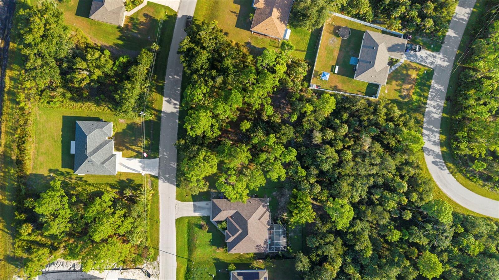 Build your dream home on this beautiful 9,998 square foot residential lot located in one of Florida’s fastest-growing cities. This property offers approximately 80 feet of frontage and 125 feet of depth, providing ample space for a custom single-family home, investment build, or future retirement retreat. The lot is situated on a quiet residential street surrounded by new construction and mature Florida landscaping. No HOA or CDD fees, and the property is not located in a flood zone (buyer to verify). Conveniently close to I-75, US-41, Wellen Park, shopping, restaurants, and Gulf Coast beaches. Zoned RSF2, allowing for single-family residential use. Electric is nearby, and well and septic are needed. North Port continues to attract new residents and investors seeking affordable land and a high quality of life in Sarasota County. This is a great opportunity to secure your piece of Florida and build when ready.
