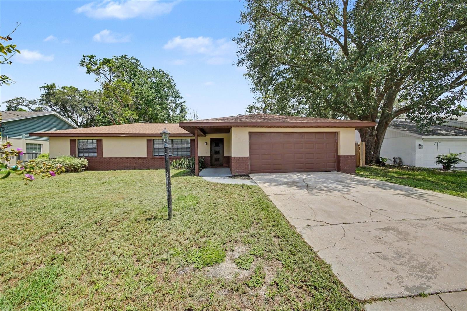 Welcome to this 3-bedroom, 2-bathroom home located in the Deltona Lakes neighborhood. This home features a bright and inviting open floor plan that allows for a seamless flow between the main living spaces. The kitchen is fully equipped with durable granite countertops and sleek stainless-steel appliances, creating a highly functional space for cooking and gathering. The primary bedroom offers comfortable living with the added convenience of a large walk-in closet. Ideally located, this home is situated near local schools, shopping centers, and parks. The location also provides easy access to I-4, making your daily commute to major employers and nearby cities a breeze.