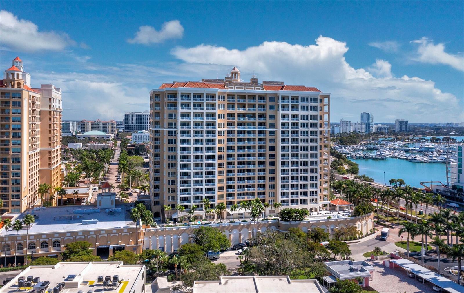 Set high on the 14th floor of the private, luxurious Ritz-Carlton Tower Residences, this elegant three-bedroom, three-bath residence captures breathtaking views of the blue-green waters of the Gulf and Sarasota Bay. Every room with Floor-to-ceiling windows fill the home with natural light, framing ever-changing skies, sparkling water, and glowing sunsets that feel like they were made just for you. Step outside to the nearly 600-square-foot terrace—perfect for morning coffee, sunset cocktails, and effortless entertaining.

Inside, the professionally designed interior features gorgeous hardwood flooring throughout, custom cabinetry and built-ins, motorized blinds, plantation shutters, and an integrated entertainment center with televisions and surround sound—creating a space that is both elevated and comfortable. Every detail is designed to feel refined, inviting, and easy to live in.

Living at The Ritz-Carlton is more than just owning a beautiful residence—it’s a world-class lifestyle with legendary service. Owner amenities include beautifully appointed social and recreational spaces, state-of-the-art fitness facilities with sauna and steam baths, a massage room, and a resort-style outdoor heated pool and hot tub. Enjoy concierge service, 24-hour in-residence dining, valet, and around-the-clock security.

Perfectly positioned in the heart of downtown Sarasota, you’re just moments from the area’s finest beaches, shopping, dining, fishing, golf, theater, and art galleries. Membership opportunities are also available for The Members Golf, Beach and Spa Clubs, offering an additional layer of private, resort-style experiences.