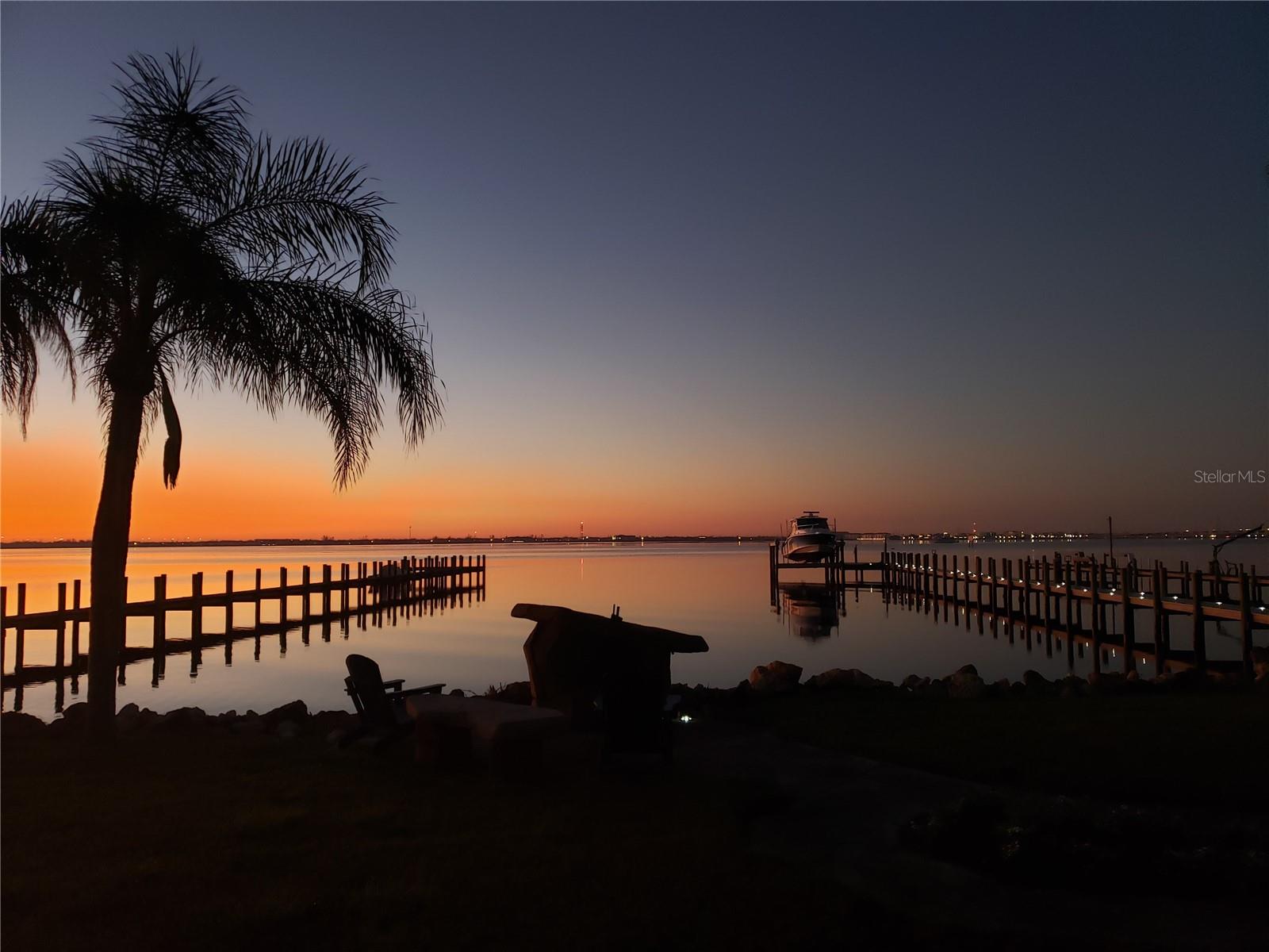 Enjoy the most MAGICAL SUNRISES & SUNSETS from your backyard on the BEST LOT ON CHARLOTTE HARBOR, NOW AVAILABLE. It is truly a
fishing and boater's paradise with AMAZING VIEWS AND LOCATION! Owners' plans changed so do not miss out on this nearly 1-acre site, with an
extra deep lot, full privacy fencing along the Western border, established vegetation, and mature trees for privacy. 
Two NEW power
meters and one water meter in place to speed along construction. Full floor plans and recent surveys available upon request. Dock and pilings in
place with deep water (formerly had a 42' boat at end) on site. Nearby to all things Port Charlotte and Punta Gorda, Sunseeker, great hospitals,
shopping, and more, including I-75, & the PGD airport. Check it out today!