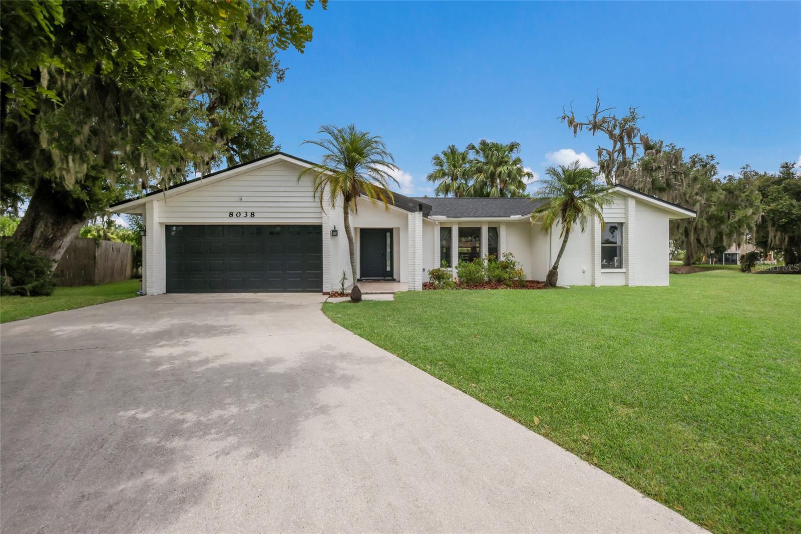 Welcome to Thousand Oaks, where you'll enjoy low HOA fees, no CDD fees, and the charm of a quiet, established community. Nestled on a peaceful cul-de-sac, this beautifully maintained 3-bedroom, 2-bath POOL home offers approximately 1,600 square feet of thoughtfully designed living space with a desirable split floor plan.

Inside, you'll find wood-look tile flooring throughout, a spacious kitchen featuring custom 42-inch soft-close cabinetry, quartz countertops, and plenty of storage, along with a cozy wood-burning fireplace that brings warmth and rustic charm to the living space, creating the perfect spot to gather on cooler evenings. A brand-new roof, installed in 2025, adds lasting value and peace of mind.

Step outside to your own private backyard retreat. Situated on an oversized 0.35-acre lot, this home boasts a large screened lanai overlooking a spacious pool and a quick-heating gas spa, allowing you to enjoy a relaxing soak in minutes. It's the perfect setting for entertaining family and friends or enjoying Florida's beautiful weather year-round. With plenty of yard space beyond the pool, there's still room for pets, play, or gardening.

Combining comfort, charm, and an exceptional indoor-outdoor living experience, this Thousand Oaks gem is ready to welcome its next owners. Thousand Oaks is nearby schools, Parks, shopping, dining, and more.