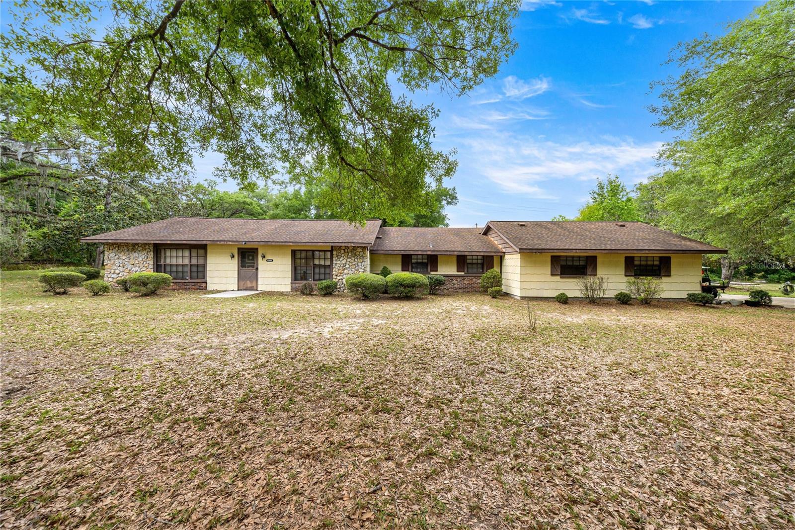 Discover the space and flexibility you’ve been looking for with this 4 bedroom, 3 bathroom home situated on almost 10 acres of land. Offering a blend of comfortable living and expansive outdoor potential, this property provides a unique opportunity for a variety of uses. The home features a functional layout with a spacious kitchen, two separate living areas, and a wood-burning fireplace that adds warmth and character to the main living space. An oversized 2 car garage includes additional room for a workshop, storage, or hobby space. Outside, the property is enhanced by mature, established landscaping and ample open space, offering room for a range of outdoor activities or future improvements. A standout feature is the impressive 50’ x 300’ enclosed pole barn, providing exceptional versatility. This structure is well-suited for storage, equipment, vehicles, workshop space, or other uses depending on your needs. With 9.54 acres of land and a variety of functional features, this property offers space, adaptability, and opportunity in a peaceful setting. Recent significant price improvement reflects a motivated seller and provides an excellent opportunity to own this versatile property.