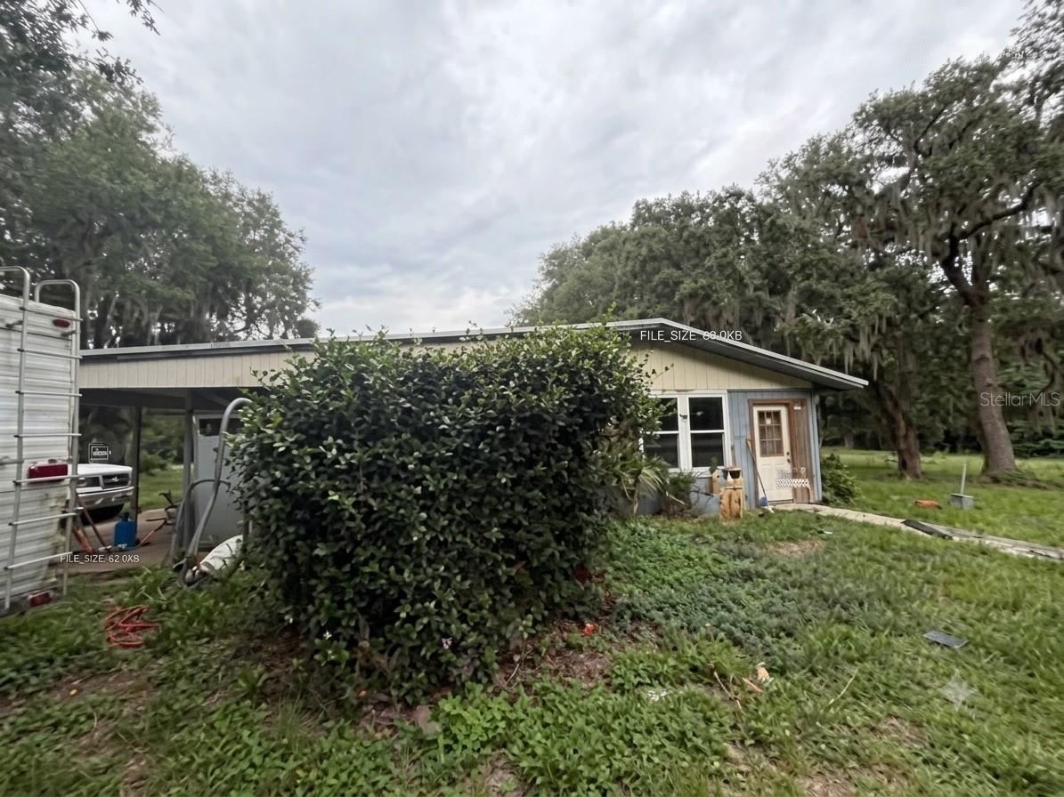 This charming 4BD/2BA single-family home offers 2,264 sq ft of comfortable living space nestled on a generous 3-acre corner lot in Palatka. The property features a impressive 3-bay barn complete with its own bathroom — perfect for hobbyists, equipment storage and a pole barn perfect for livestock. Enjoy the freedom of wide-open acreage with the convenience of a well-appointed home. A rare find for buyers seeking space, functionality, and Florida country living at its finest!