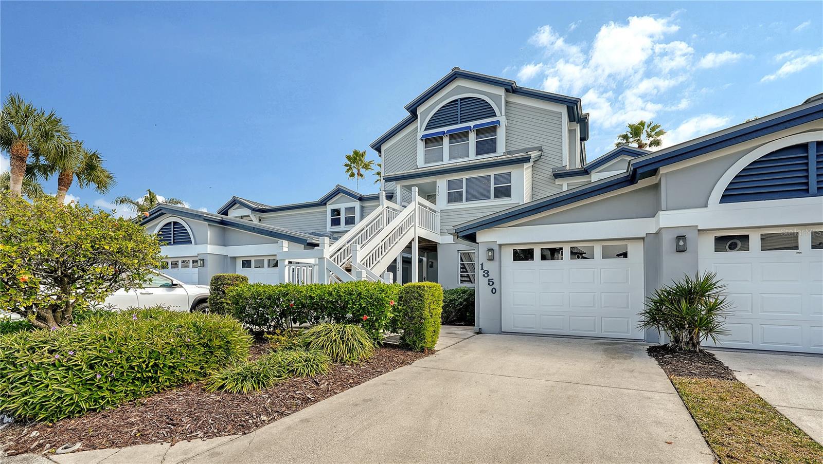 Experience turnkey island living in this second-floor, three-bedroom townhome residence at Gulf & Bay Club Bayside on Siesta Key. Offered fully furnished and operating as an active rental with strong income history, this two-story getaway presents an outstanding opportunity for personal enjoyment and investment potential in one of Sarasota’s most desirable beach communities.
Spanning nearly 1,500 square feet, the light-filled layout features tile flooring throughout the main living areas, high ceilings, and an open living/dining design ideal for gathering and entertaining. The updated granite kitchen is equipped with stainless-steel appliances, custom cabinetry, breakfast bar seating, built-in planning desk, and a sunny dining nook with additional storage.
French doors open to the screened terrace, where added windows transform this space into a true year-round Florida room—an upgrade not commonly found in many Bayside residences. This enhancement expands the usable living area and allows you to enjoy the outdoor setting in every season, whether hosting guests or relaxing after a day at the beach.
The primary suite is conveniently positioned on the main level and offers a walk-in closet, granite-appointed en-suite bath, and direct access to the enclosed terrace. Upstairs, a versatile loft provides flexible living space, while two guest bedrooms share a full bath—creating an ideal layout for visiting family or rental guests.
This residence includes a deeded garage space and benefits from weekly rental flexibility, further enhancing its income-producing appeal.
Unique Opportunity: We also have a second Gulf & Bay Club Bayside residence available in the same building on the first floor. Purchasing both properties would provide a rare chance to own five bedrooms within the same community—perfect for larger family gatherings, seasonal hosting, or multi-generational stays. Owners would enjoy the flexibility to occupy one unit while renting the other or maximize rental income throughout the year.
Gulf & Bay Club Bayside is known for its coastal architecture and resort-style amenities. Residents enjoy heated swimming pool, tennis and pickleball courts, fitness center, clubhouse, grilling stations, and a fishing dock on the Intracoastal Waterway. Deeded beach access directly across the street places Siesta Beach’s renowned quartz sands and Gulf waters just moments away.
Located in the heart of Siesta Key, this residence offers convenient access to Siesta Village’s restaurants, boutiques, and live music. Boating, paddle boarding, and waterfront dining are close by, while downtown Sarasota—home to the Sarasota Opera House, Selby Gardens, The Bay Park, and St. Armands Circle—is just a short drive away.
Whether seeking a beach retreat, a rental investment, or the flexibility of dual-unit ownership on Siesta Key, this Gulf & Bay Club Bayside residence delivers location, versatility, and exceptional lifestyle value.