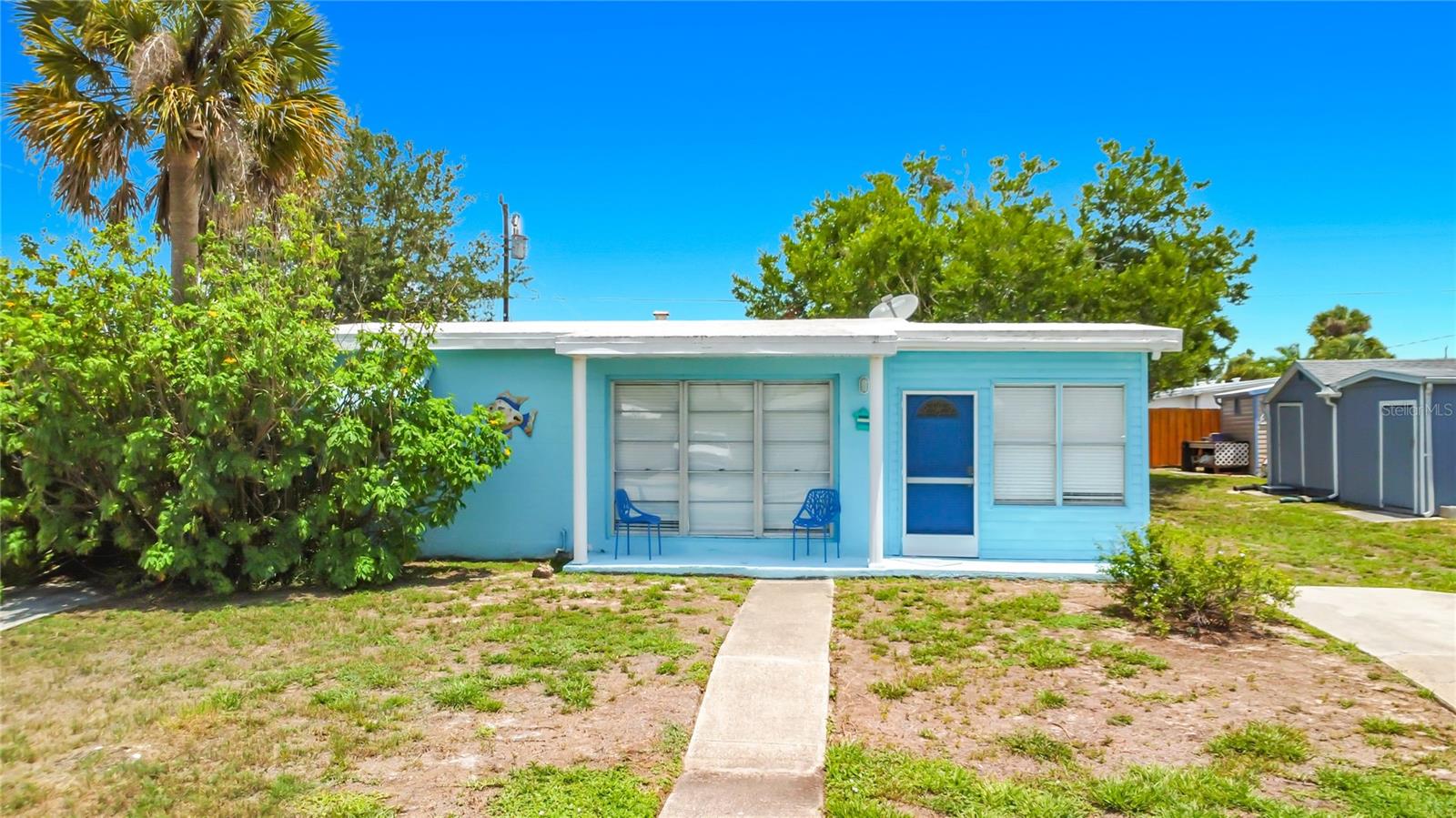 This home is turnkey and fully furnished with everything that you need, including a fully stocked kitchen, tv's, linens, and supplies. Ready to move in. There are no lease restrictions, so you can use as a vacation home, seasonal rental, short term rental, rental or primary home. No HOA and no CDD fee. 2 bedrooms, 1 bath, extra parking, new custom-made window coverings, large outdoor open patio, and open layout. Enjoy the hammock in the backyard under the big oak tree. The kitchen has stainless steel appliances and newer white cabinets. The washer and dryer (2022) are in the utility room next to the back patio. The entire home has waterproof laminate flooring. AC is 2019. This home is located just 1.1 miles from Warm Mineral Springs Park and a short drive to CoolToday Park. This home was listed on Airbnb, and rental statements are available, upon request. Call today to schedule a private showing. The agent is also the owner.