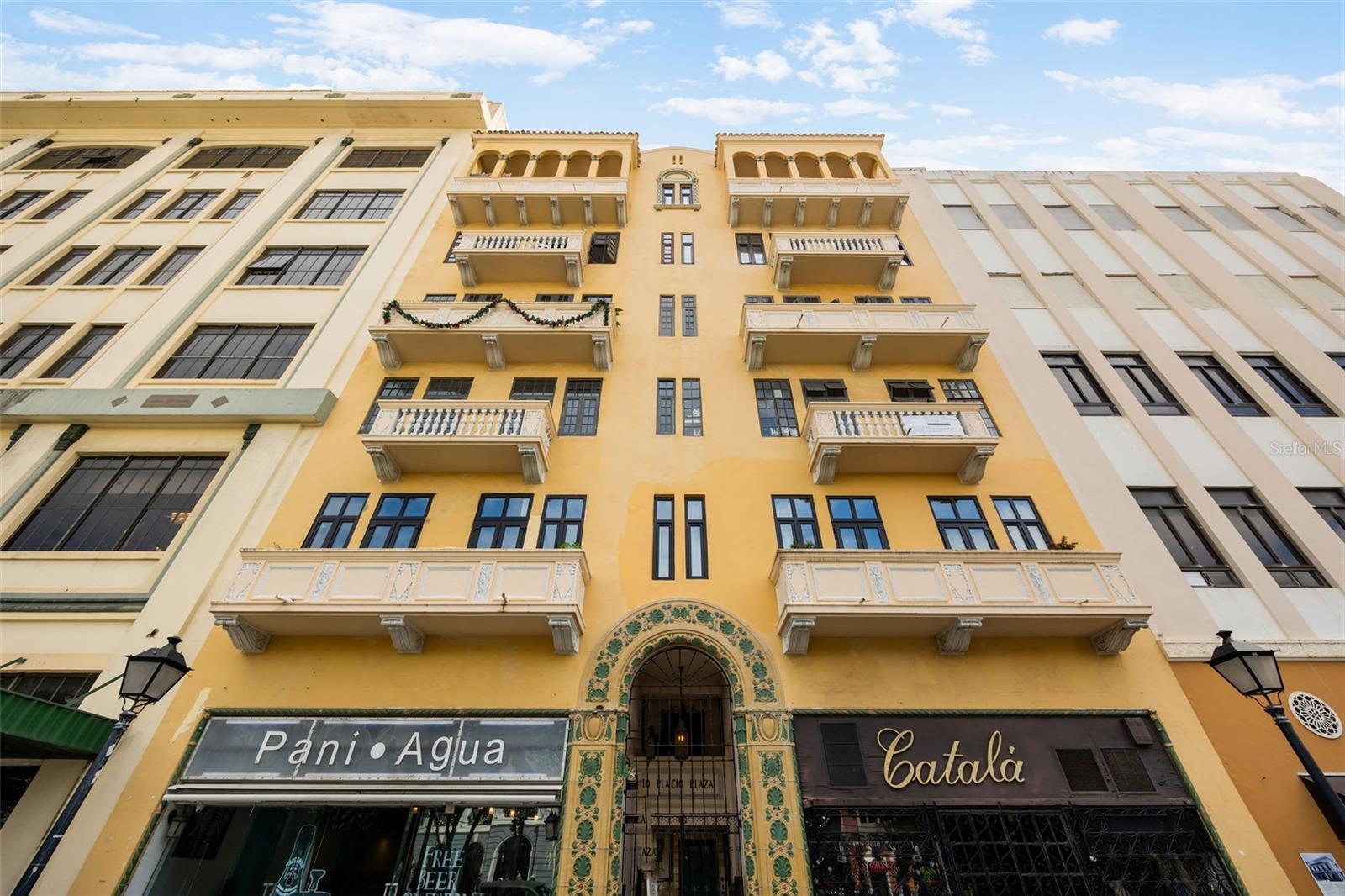 Charming Remodeled 1-Bedroom Apartment in Old San Juan with Stunning Views! Step into the heart of Old San Juan with this beautifully remodeled 1,004 sq. ft. 1-bedroom, 1-bathroom apartment that blends historic charm with modern luxury. Perched directly across from Plaza de Armas, this property offers unparalleled views of the iconic square, the picturesque old city, the bay, Casa Blanca, the Cathedral, El Morro, and more. Situated on the 7th floor of the Plaza Condominium—a 1934 Spanish Revival gem—this apartment combines classic elegance with contemporary convenience. The building, located opposite City Hall, features an elevator, and is pet-friendly. It is also equipped with Aeronet Gigabit-1 high-speed internet, offering speeds up to 500GB. Inside, the thoughtfully renovated space includes a cozy yet spacious bedroom, a stylish bathroom, and an inviting open plan living and kitchen area. Large, updated windows flood the space with natural light and a refreshing breeze. Step onto the expansive terrace, adorned with Santorini-inspired doors, to enjoy your private outdoor retreat. Overlooking Plaza de Armas, it’s the perfect spot for morning coffee or evening sunsets. The terrace also connects to a versatile bonus room that can serve as an office or gym. HOA fees are $145/month, covering water, while annual taxes are just $813. The unit also benefits from a private water cistern. This apartment offers a perfect blend of historic details and modern upgrades, making it a rare find in an original Old San Juan building. Explore the vibrant culture, rich history, world-class dining, shopping and renowned landmarks. Whether you’re looking for a romantic retreat, a lucrative rental income, or your very own sanctuary in Puerto Rico, this exceptional property has it all. Don’t miss your chance, schedule a private showing today and experience the enchantment of Old San Juan living in Puerto Rico!  ALSO AVAILABLE FOR RENT $2,250/MONTH, FURNISHED.