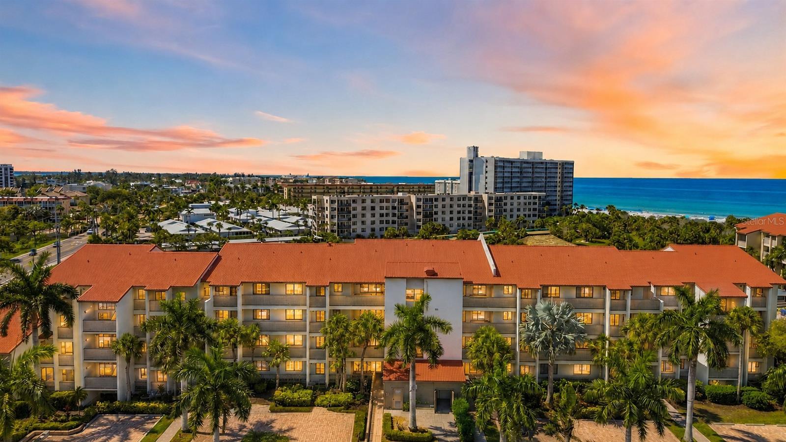Welcome to Residence #307 at Siesta Dunes, a beautifully remodeled two-bedroom, two-bath condominium located directly on world-famous Siesta Key Beach with views of the Gulf from the lanai and the primary bedroom. Offering 1,250 square feet of comfortable coastal living on the third floor, this turnkey furnished residence is ready to enjoy from day one — whether as a personal beach retreat, full-time residence, or investment property. Inside, the home has been thoughtfully decorated with a relaxed, sophisticated coastal feel. Crown molding adds a finished touch throughout, while the remodeled kitchen features granite countertops, stainless steel appliances, glass tile backsplash and a clean, functional design that makes everyday living and entertaining easy. The spacious living area opens to an enclosed lanai surrounded by lush garden views, creating a peaceful place to enjoy morning coffee, read, or unwind after a day at the beach. The lanai is enclosed with hurricane-resistant sliders, and the primary suite features hurricane-resistant windows for added peace of mind. The primary bedroom also includes a walk-in closet, and views of the Gulf.  The convenience of an in-unit stackable washer and dryer hook up makes this residence especially easy to live in and enjoy. Additional features include an assigned covered carport located close to the building, private storage closet, ample guest parking, and access to the building elevator. Siesta Dunes is a gated beachfront community known for its resort-style amenities and beautifully maintained grounds. Residents and guests enjoy a heated pool and spa, beachside deck, pavilion, clubhouse, tennis courts, and direct access to one of the most celebrated beaches in the country. The on-site property management company also helps make renting the property simple and convenient. With strong rental-income potential, two-week minimum rentals from January 15 through the end of April, and one-week minimum rentals the rest of the year, this condominium offers a compelling combination of lifestyle and investment opportunity. Enjoy it for your own vacations, create a family beach tradition, and rent it when you are not using it. Perfectly positioned on Siesta Key, this location makes it easy to enjoy Sarasota’s exceptional dining, shopping, arts, and entertainment, while coming home to the powdery white sand, clear Gulf waters, and unforgettable sunsets that make Siesta Beach so special. Whether you are looking for a vacation getaway, income-producing property, or a place to build lasting memories, Residence #307 at Siesta Dunes offers the best of beachside living.