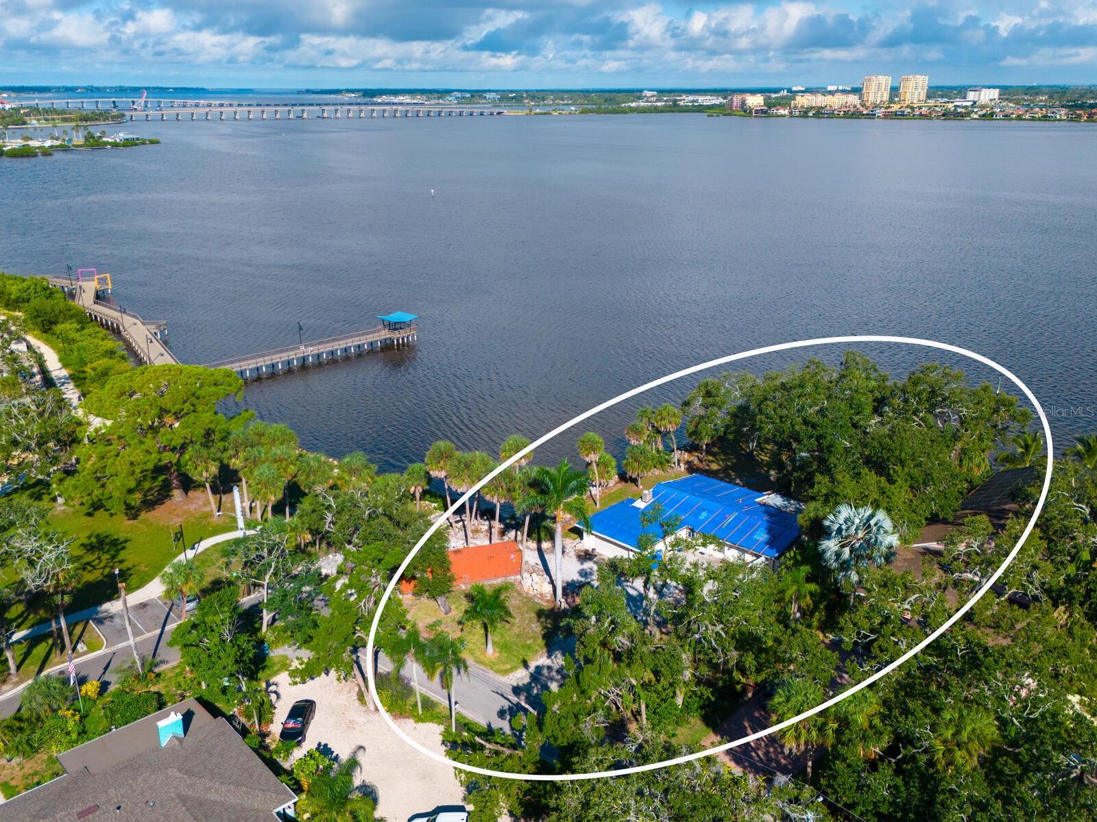 Sunsets, Sailboats & Serenity Meet — A Premier Manatee River Homesite 

BUILD YOUR WATERFRONT DREAM HOME on over ½ acre of prime riverfront property with approximately 107' x 171’ of waterfrontage, showcasing breathtaking sunset views and iconic vistas of the Hernando DeSoto Bridge.

This rare offering presents the perfect opportunity to build a custom estate or renovate the existing residence, which currently features 2 bedrooms, 2 bathrooms, and a 2-car garage. A private dock extends directly into the Manatee River, providing immediate access to boating and endless water recreation.

Wake up to manatees and dolphins gliding past, watch boats cruise by from your backyard, and enjoy the serenity of true riverfront living. Create a private backyard oasis designed for relaxation, entertaining, and enjoying Florida’s natural beauty. Bring your boats, jet skis, wave runners, and more — with ample space to add an RV or oversized garage if desired.

Located in a quiet, non–deed restricted neighborhood, this property is just a short walk or bike ride to the hospital and the charming downtown waterfront district, offering dining, shopping, and local events.

A rare blend of location, lot size, water access, and flexibility — INVESTORS WELCOME