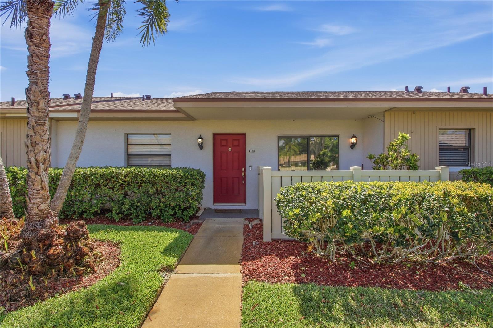 Spacious 3-bedroom, 2-bath villa offering 1,385 square feet of comfortable living in desirable East Lake Woodlands. This home features ceramic tile throughout the main living areas and cozy carpet in the bedrooms. The bright living room is lined with sliding glass doors that open to a screened lanai spanning the full length of the villa—perfect for enjoying indoor/outdoor Florida living.
The primary bedroom and third bedroom both feature private patio door access to the screened lanai, while ceiling fans in the bedrooms add extra comfort. Enjoy additional outdoor space with a fenced front patio, plus extra storage located on the screened lanai.
Your covered carport includes an additional storage unit and comes with one assigned parking space. Currently occupied by excellent tenants. For buyers looking to make this home their own, a lease termination may be negotiated.