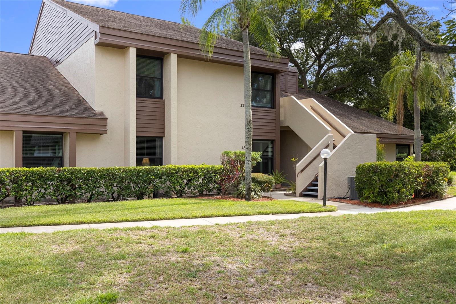Welcome to Countrybrook, one of Palm Harbor's hidden gems, where natural beauty, tranquility, and convenience come together. Nestled among mature oak trees and lush landscaping, this spacious 3-bedroom, 2-bath condominium offers a peaceful retreat overlooking the community's scenic preservation areas and park-like grounds.Inside, you'll find an open and inviting floor plan with access to an oversized patio and views of the natural preserve in your backyard. The spacious split-bedroom layout provides both privacy and functionality, making it ideal for families, year-round living, seasonal residents, or those seeking a low-maintenance Florida lifestyle.Step outside and enjoy the serene surroundings that make Countrybrook so special. Residents enjoy a sparkling community pool, beautifully maintained grounds, and the peaceful ambiance of a nature-filled setting rarely found at this price point. Whether you're enjoying your morning coffee on the patio or taking an evening stroll through the community, you'll appreciate the quiet beauty that surrounds you.Located in the heart of Palm Harbor, Countrybrook offers easy access to everything that makes North Pinellas County one of Tampa Bay's most desirable places to live. Just minutes away are award-winning Gulf beaches, Honeymoon Island, Downtown Dunedin, Safety Harbor, world-class golf courses, shopping, dining, medical facilities, and Tampa International Airport. Outdoor enthusiasts will love the nearby parks, trails, and nature preserves, including the renowned Brooker Creek Preserve and Philippe Park.Families will appreciate the highly regarded school assignments, including Curlew Creek Elementary, Palm Harbor Middle School, and Countryside High School.If you're searching for a home that combines natural beauty, a desirable Palm Harbor location, excellent schools, and a carefree maintenance lifestyle, this Countrybrook condo is a must-see.