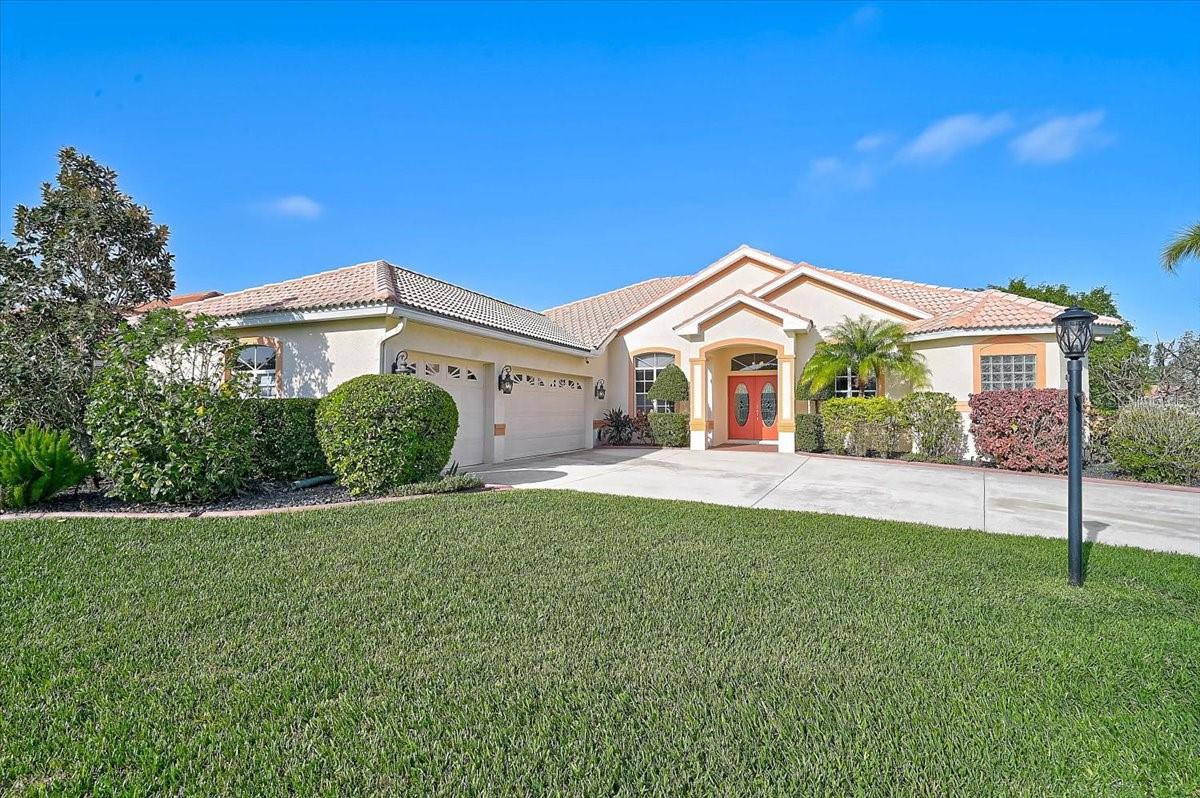 Located in the highly desirable McIntosh Lake community of Sarasota, this beautifully maintained 4-bedroom, 3-bathroom home offers an oversized 3-car garage and sits on a spacious corner lot!

Inside, you’ll find a bright, thoughtfully designed floor plan with abundant natural light and multiple living and entertaining spaces. The welcoming living room features French doors leading to the screened-in lanai. The spacious kitchen includes a center island, breakfast bar, walk-in pantry, and additional storage, all overlooking the family room with a cozy propane fireplace—perfect for everyday living and entertaining.

The split-bedroom floor plan provides privacy, highlighted by a spacious primary suite with walk-in closets, walk-in shower, dual sinks, brand-new countertops and plumbing fixtures throughout the home’s bathrooms, giving a fresh modern feel.

Designed for entertaining, an additional seating area includes built-in shelving, a wine rack, and wine refrigerator. Step outside to enjoy the private lanai with heated pool. A buried 250-gallon propane tank heats the pool and also services an outdoor grill hookup.

Additional highlights include a new HVAC system (2024), laminate flooring and tile throughout, updated ceiling fans, three new windows and window treatments throughout the home. The kitchen features a new sink and fixtures, while new lighting enhances the breakfast nook, entryway, and formal dining room. The home also offers generous storage, a spacious laundry room, security cameras, a video front doorbell, and a new yard lamp post.

Conveniently located just minutes from A-rated schools, Siesta Key Beach, the Legacy Trail, shopping, dining, golf courses, nature preserves, downtown Sarasota, and Sarasota-Bradenton International Airport, this home offers the perfect combination of comfort, location, and Florida lifestyle. 

Schedule your private showing today! NO CDD FEE, NO FLOOD INSURANCE REQUIRED!