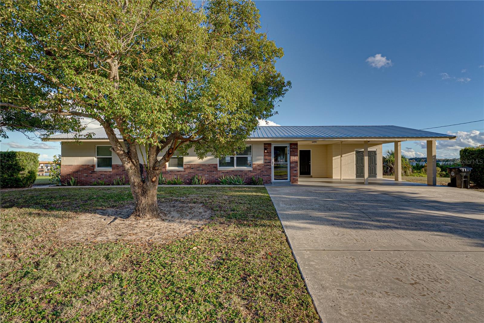 New Price on this Charming 3BR/2BA lakefront home on Lake Reedy! Enjoy an open living/kitchen/dining layout with new flooring throughout and a new 2025 metal roof. The bright Florida room overlooks the lake, offering the ideal spot for morning coffee and stunning views year-round. Property features include a concrete seawall, approx 124 ft. of lakefrontage, 2-car carport, storage room, and laundry room.
Located close to parks and downtown, this home offers the perfect blend of convenience and lakefront living. Lake Reedy (3,600+ acres) is known for great fishing, boating, and outdoor recreation—ideal for outdoor lovers, or anyone who enjoys the water.