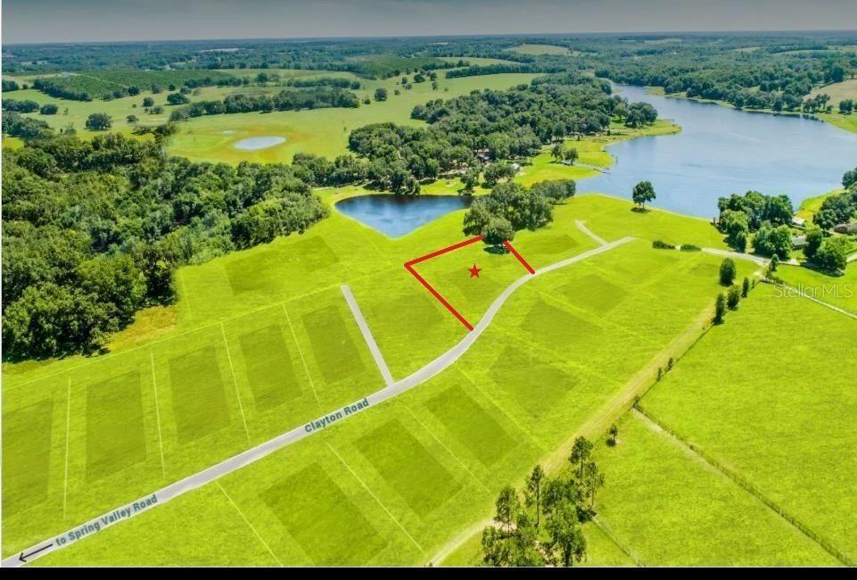 Welcome to this stunning property located at 34710 Clayton Rd, Lot 13 in Dade City, FL. This ACRE lot overlooking Blanton Lake provides a prime opportunity to build your dream home amidst beautiful surroundings. The spacious lot provides ample room for creative landscaping and outdoor activities. Enjoy the tranquility of the area while being conveniently close to local amenities and attractions. Don't miss the chance to own a piece of this charming private waterfront community. Builder offering multiple land opportunities.