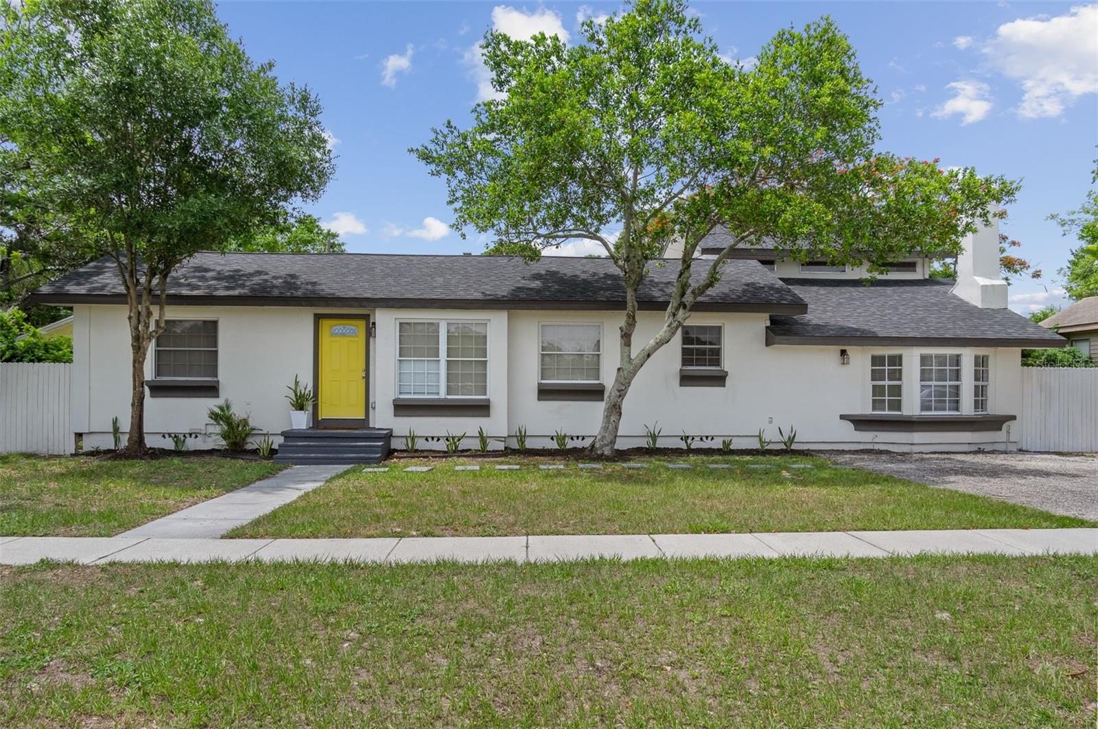 This large, multi generational home has so much to offer!! With an extremely large and accessible lot in the heart of Saint Petersburg, I can’t imagine the value of this home, not continuing to climb in the coming years! The master suite feels like your own, private oasis with your own wine bar, fireplace, stairs, leading up to the private office(complete with it’s own 1/2 bath), balcony overlooking your large yard, a master bathroom with a soaking tub, walk-in shower, and a large walk-in closet. The main home features two large entertainment areas that flow together, a cute little breakfast, nook, and three additional bedrooms. Anything you find this home lacking, is made up for by its sheer size, location, utility, and, of course LOCATION!