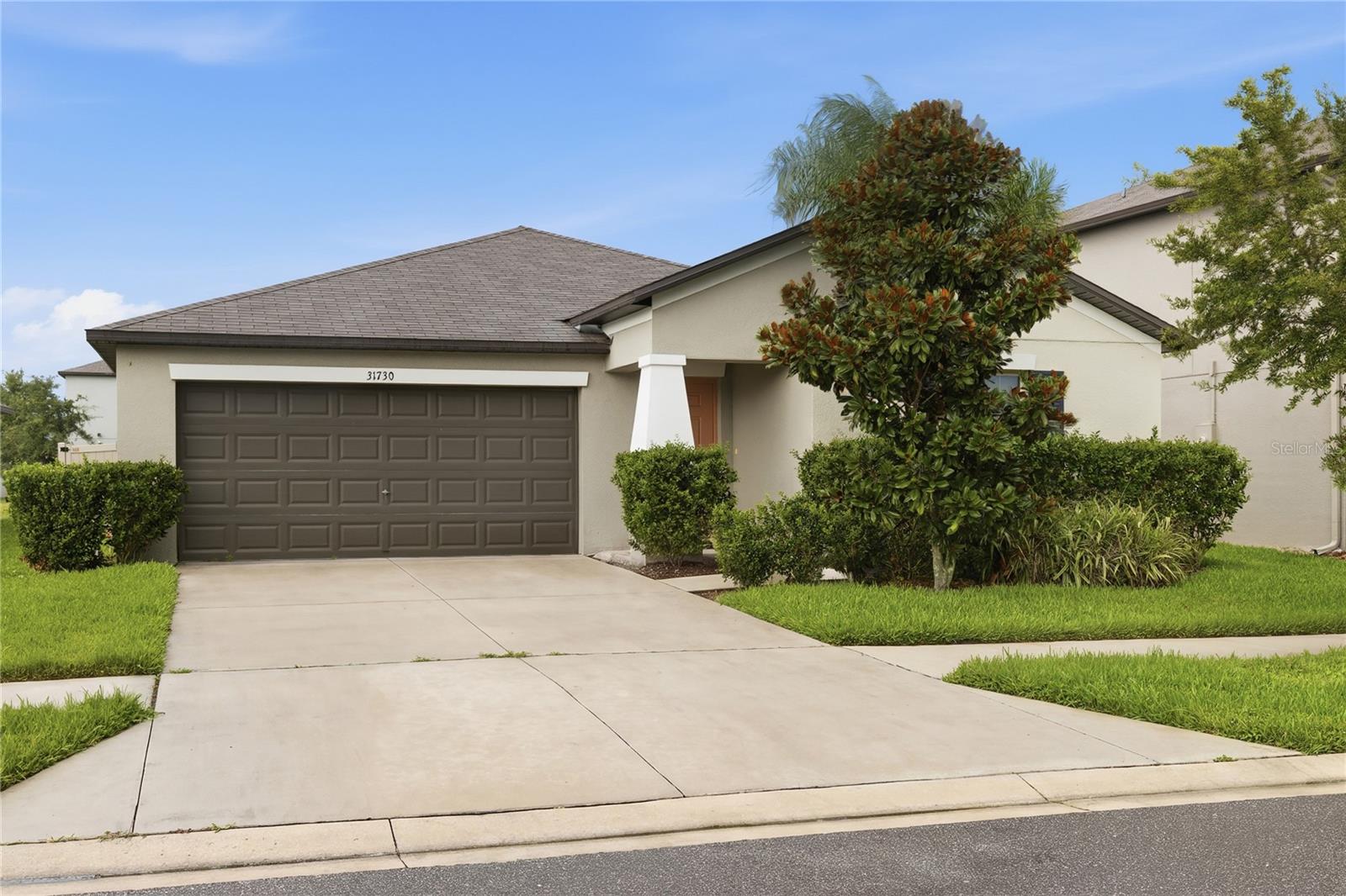 Welcome to this beautifully maintained three-bedroom, two-bathroom home with a two-car garage, perfectly located in the highly desirable Epperson Lagoon community of Wesley Chapel. This charming one-story home offers a bright, open-concept floor plan designed for comfortable everyday living and effortless entertaining.

The spacious kitchen features ample cabinetry, a large center island, and generous counter space, flowing seamlessly into the dining and living areas to create the perfect gathering space for family and friends. The private primary suite offers a relaxing retreat with an en-suite bathroom and a spacious walk-in closet, while two additional bedrooms provide flexibility for family, guests, or a home office. A convenient indoor laundry room adds to the home’s functionality.

Step outside to an oversized backyard with plenty of room to create your own outdoor oasis, whether you envision a pool, play area, garden, or the perfect space for entertaining family and friends.

As a resident of Epperson, you’ll enjoy exclusive access to the world-famous Crystal Lagoon, featuring crystal-clear water, sandy beaches, kayaking, paddleboarding, swimming, community events, and endless opportunities for outdoor recreation. This golf-cart-friendly community also offers parks, walking trails, and an active lifestyle unlike any other.

Conveniently located near top-rated schools, shopping, dining, Tampa Premium Outlets, KRATE at the Grove, major medical facilities, and I-75, you’ll enjoy easy access to downtown Tampa, Tampa International Airport, and Florida’s award-winning Gulf Coast beaches.

Don’t miss your opportunity to own this beautiful home in one of Wesley Chapel’s premier resort-style communities. Schedule your private showing today!