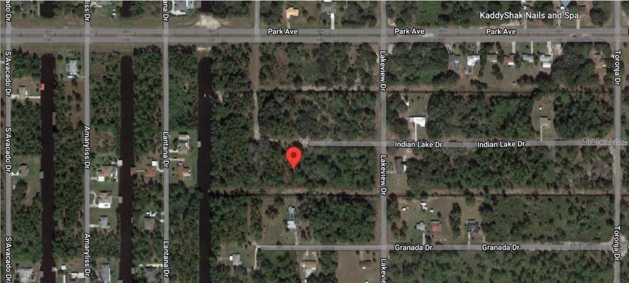 Build your dream home on this beautiful half-acre lot located in the peaceful lakefront community of Indian Lake Estates, a hidden gem in the heart of Central Florida. Known for its outstanding golfing, fishing, and boating opportunities, this welcoming community surrounds the famous 7,500-acre Lake Walk-in-Water, one of Florida’s premier bass fishing destinations and located approximately 20 miles east of Lake Wales. Residents enjoy access to exceptional lakefront amenities, including a sandy beach, boat ramp, marina, and Florida’s longest freshwater fishing pier. The pier area features a covered pavilion with propane grills and picnic tables, creating the perfect setting for family gatherings and outdoor entertaining. Indian Lake Estates offers an impressive array of community amenities, including an 18-hole golf course, tennis and basketball courts, a 23,000-square-foot clubhouse, café, post office, churches, library, fitness center, and pro shop. Nature lovers will appreciate the abundance of wildlife, with frequent sightings of deer, wild turkeys, cranes, turtles, raccoons, and a variety of native birds. Conveniently located, Orlando, Walt Disney World, and other world-famous attractions are just over an hour away, while Tampa, Busch Gardens, and the Gulf Coast’s beautiful beaches are within easy driving distance. Nearby attractions include the historic Bok Tower Gardens in Lake Wales and the renowned Westgate River Ranch Resort & Rodeo, located just six miles away. This 1,700-acre destination offers horseback riding, airboat and swamp buggy adventures, championship rodeos, zip lines, nature trails, a petting farm, marina access, and multiple dining options, along with unique Western-inspired accommodations. If you're seeking a peaceful lifestyle surrounded by nature while still enjoying convenient access to Florida’s top attractions, Indian Lake Estates offers the perfect blend of recreation, relaxation, and small-town charm. Come discover why so many consider it Polk County’s best-kept secret.