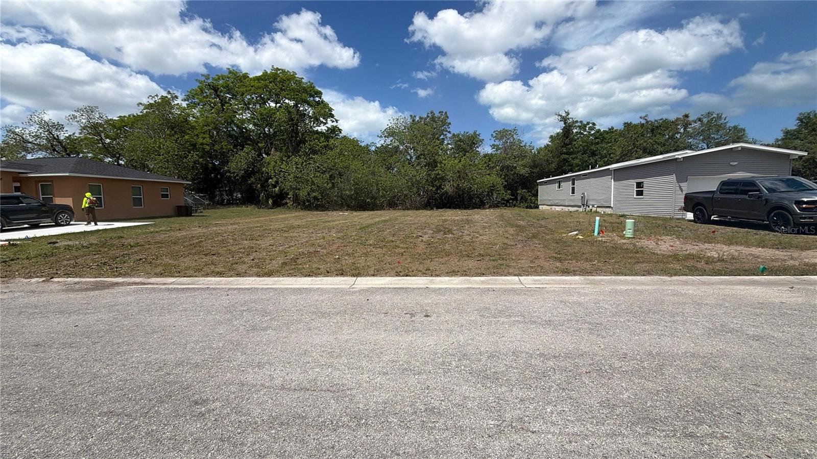 Build your dream home on this cleared, buildable 0.21-acre lot in the growing Bolton Heights West community. No HOA or CDD! Public utilities are available, making the building process even more convenient. Enjoy a peaceful residential setting just minutes from US-19, shopping, dining, medical facilities, and the Gulf of Mexico. Whether you're building your primary residence or investing for the future, this is an excellent opportunity in a rapidly growing area.