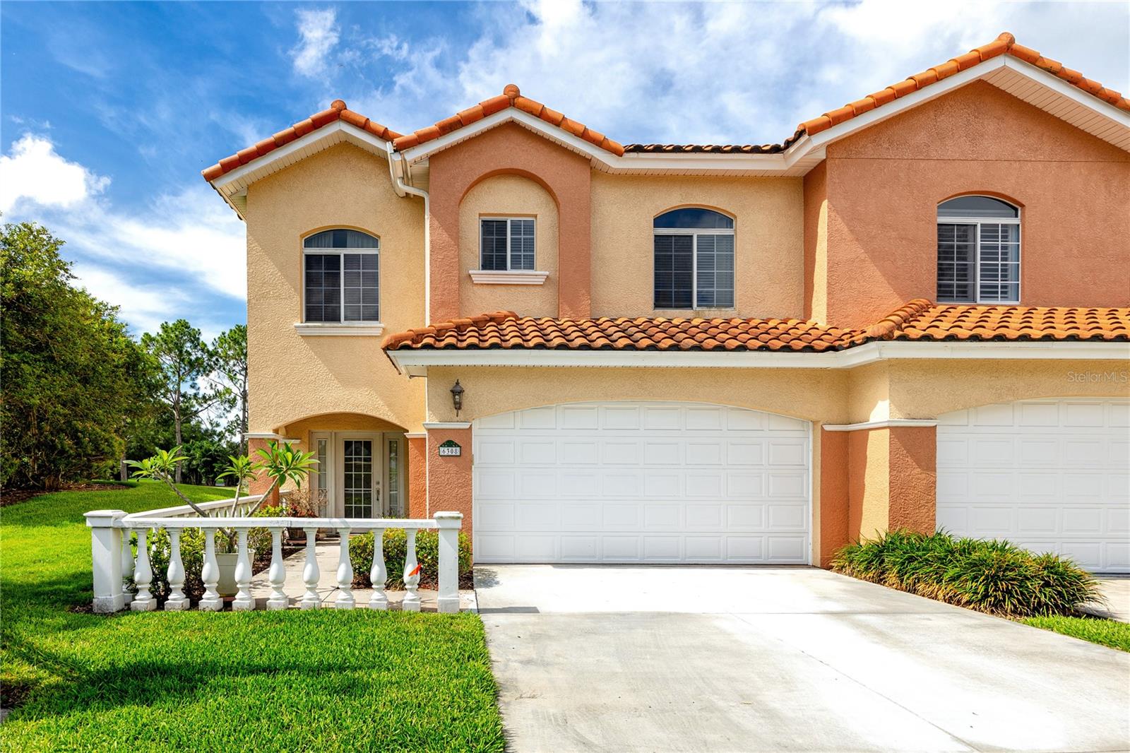 Enjoy easy living with beautiful golf course views in the highly desirable gated community of Villas Del Verde. Overlooking the fairways of Pasadena Yacht & Country Club, this spacious corner townhome offers over 2,600 square feet of living space, combining comfort, privacy, and an incredible location.

Step inside and you'll immediately notice the open, light and bright floor plan featuring rich cherry wood flooring, crown molding, and expansive windows that showcase peaceful views of the golf course. The layout is perfect for both entertaining and everyday living, with generous living and dining spaces that flow effortlessly together.

The kitchen offers wood cabinetry, Corian countertops, and a cozy breakfast nook, where French doors open to a private lanai overlooking the pond and the 9th tee. It's the perfect spot to enjoy your morning coffee or relax at the end of the day while taking in the scenery.

One of the standout features of this home is the private elevator, providing convenient access between floors in addition to the traditional staircase.

Upstairs, the spacious primary suite feels like a retreat of its own, complete with two walk-in closets, a private balcony with golf course views, and a large ensuite bath featuring a garden tub, separate shower area, bidet, and private water closet. Two additional bedrooms and a large laundry room provide plenty of space for family, guests, or a home office.

Residents of Villas Del Verde enjoy access to a heated 60-foot pool, spa, fitness center, and clubhouse, all within a beautifully maintained gated community. Plus, you're just minutes from the Gulf beaches, downtown St. Petersburg, shopping, dining, and everything the Florida lifestyle has to offer.