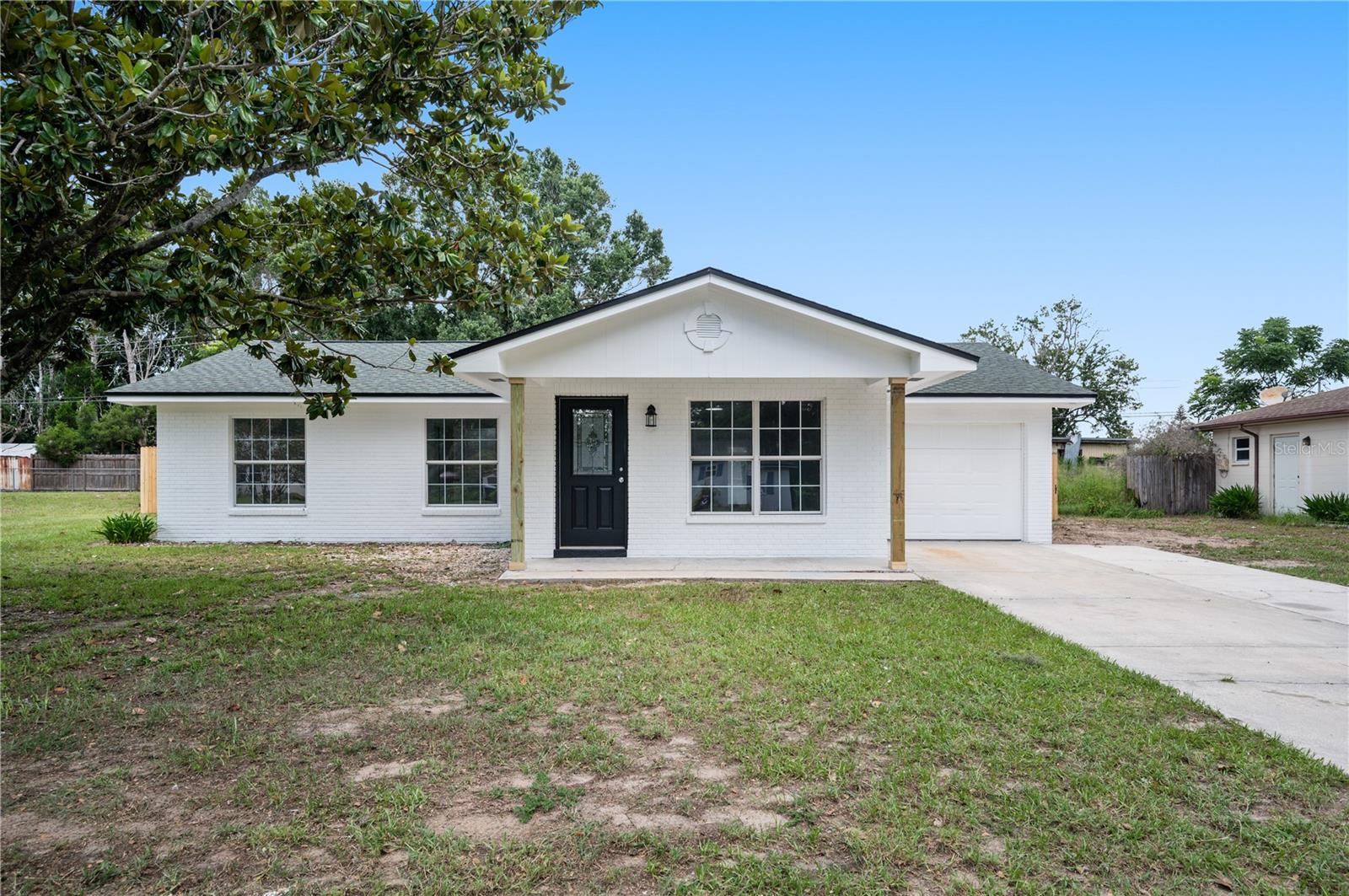 Welcome to this beautifully updated 3-bedroom, 2-bathroom home with a private pool located in Lakeland, Florida. This property offers the rare advantage of NO HOA and a spacious partially fenced backyard. The kitchen has been fully refreshed with new cabinets, countertops, and newer stainless steel appliances. Both the master bathroom and hallway bathroom have been tastefully updated for a modern feel. The home features new waterproof LifeProof flooring throughout for durability and easy maintenance. A new roof was installed just two years ago, offering peace of mind for years to come. The interior and exterior have been freshly painted, giving the home a clean and inviting appearance. All interior doors have been replaced, along with updated lighting fixtures throughout the home. Enjoy Florida living with your private pool, complete with a brand new pool pump and filter system. The back porch has been re-screened, creating a comfortable outdoor space for relaxing or entertaining. The large backyard provides plenty of room for pets, play, or future outdoor additions. The open and functional layout makes everyday living and entertaining easy and enjoyable. Located in a desirable Lakeland area close to shopping, dining, and major roadways, this home offers both convenience and privacy. With extensive updates already completed, this home is truly move-in ready. Don’t miss the opportunity to own this updated pool home with no HOA restrictions in the heart of Lakeland.