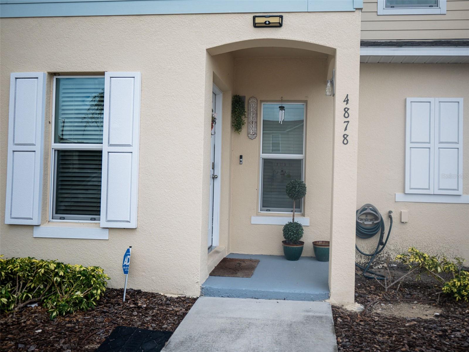 ATTENTION BUYERS: Primary residence, INVESTORS for Airbnb or short-term rentals. FIESTA KEY is a resort-style and peaceful living 24-gated community with an excellent location close to Disney parks, restaurants, shopping, schools, and more! This townhome has 3 bedrooms, 2 bathrooms, and the laundry upstairs for privacy. You will enjoy the first floor in an open floor plan, the living room, and the half bathroom. You will love the lanai for your morning coffee or to read a book. Kitchen appliances included. Amenities: clubhouse, fitness center, tennis court, walking trails, walking distance to clubhouse, resort-style pool, and a 2nd. pool inside the gated community. Live free and unworried about outside maintenance because the HOA takes care of it: roof, painting, lawn, etc.