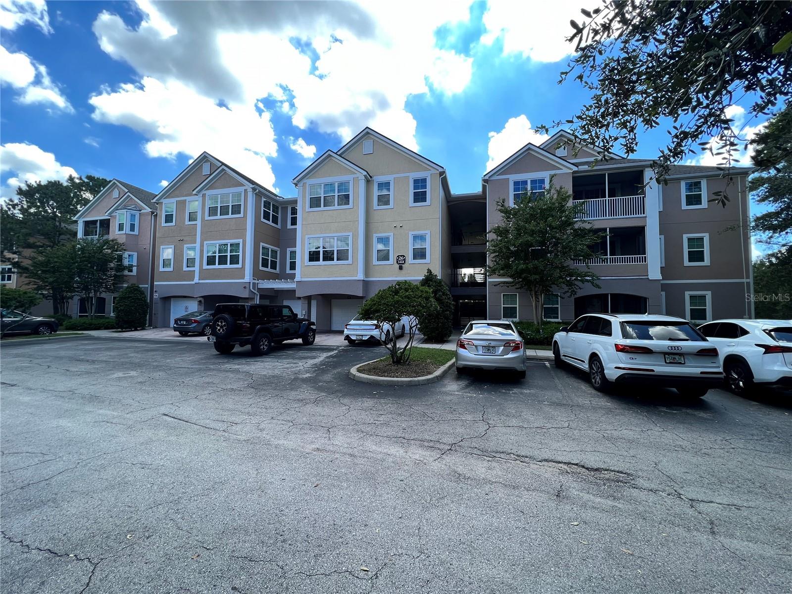 Introducing this charming 2-bedroom, 2-bathroom waterfront unit with a private garage - your next perfect home! 

This property is move-in ready and offers a plethora of amenities within the subdivision, including two pools, basketball courts, restaurants, shopping, and more. Safety and peace of mind are ensured with a gated entrance manned by a security guard. Discover the serene Turkey Lake just behind the condo, ideal for leisurely strolls and embracing the Hamptons at Metrowest lifestyle. For those who prefer relaxation, savor breathtaking lake views from every room, and unwind on your back porch while overlooking the water. 

The condo boasts a stylish interior with carpeting in most areas, except for the wet zones. Garage D, complete with an opener, provides convenience and shelter from the rain, making it a rare find among similar units. 

Don't miss the opportunity to experience this delightful condo - you'll be delighted you did!