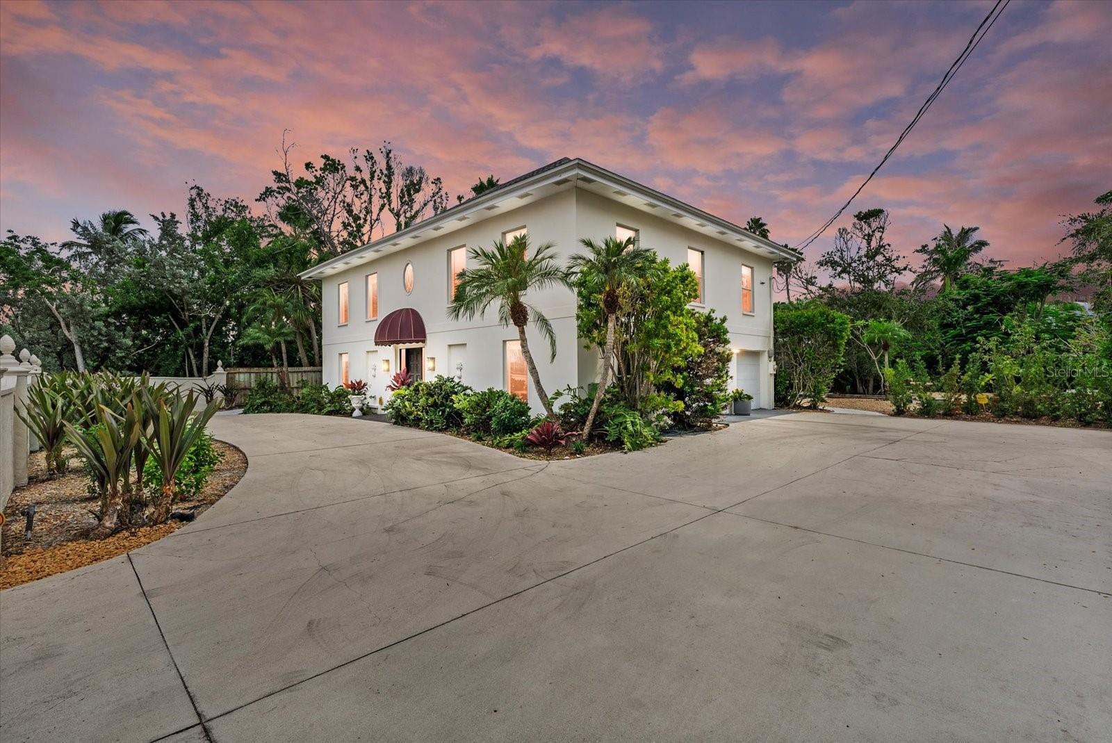 Welcome to your dream family home on Bay Island, located on the premier north end of Siesta Key. This inviting 2-bedroom, 2-bathroom residence is nestled among beautiful homes on Norsota Way, one of Sarasota's most coveted streets, offering a perfect blend of comfort and elegance. Located in an exclusive neighborhood with multimillion-dollar homes, this property presents an incredible value opportunity. This solidly built block construction home offers peace of mind and durability without sacrificing old school Florida charm. The main living level is elevated on the second story and features a spacious open floor plan designed for ease and relaxation, including partial water views of Sarasota Bay from the upstairs bedrooms and a wrap-around deck, perfect for enjoying your morning coffee. This home includes approximately 1,527 additional square feet on the first floor, which is not included in the main living space square footage. From here, step outside through the sliding doors to discover a recently resurfaced pool and spa with brand new pool and pump equipment (2025), set in a captivating garden oasis. This gem is adorned with numerous updates, including a new hot water heater (2024), upstairs and downstairs HVAC systems (2024), a new furnace (2024), a new refrigerator (2024), a new washer and dryer (2024) and fresh landscaping. Just steps away, you'll find a gorgeous park with unobstructed views of passing sailboats, friendly dolphins, breathtaking sunsets, the Ringling Bridge and Sarasota skyline. Shell Beach is only a short stroll away or hop on your bike or golf cart and ride to Siesta Beach, Siesta Village, Southside Village, or to the Field Club for family-friendly entertainment. Sarasota Memorial Hospital, Out of Door Academy, Southside Elementary School are also less than two miles away. Don’t miss your chance to own a piece of paradise in this exclusive enclave! Schedule your private tour today!