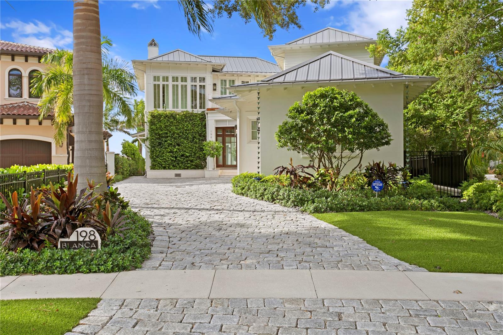 Wow!! Wow!! Wow!! Welcome to your Davis Island DREAM Home!!! This West Indies style architectural masterpiece was designed by well known architect Steven Smith and built by award winning builder Craig Ross. This 5,078 square feet 4-bedroom 6-bathroom home was built in 2019 and is a must see on highly sought after and very exclusive Davis Islands with beautiful open bay views. Drive up the Brick stone driveway and find the 3-car climate-controlled garage with additional golf cart parking space. Once inside you will be greeted by the beautiful Tampa Bay water view, with a strategically designed breakfast nook with amazing views. Second story wood tiled patio that is perfect for viewing sunsets and relaxing after a busy day. Beautifully designed custom closets, with hidden entry way. Laundry rooms conveniently located downstairs and upstairs.   This home has a spectacular outdoor entertaining area, with a resort style feel. Infinity pool and jacuzzi, outdoor shower, fully equipped outdoor kitchen with bar that is perfect for entertaining family and friends. DO NOT MISS OUT on this unique opportunity to be on Davis Islands!!!