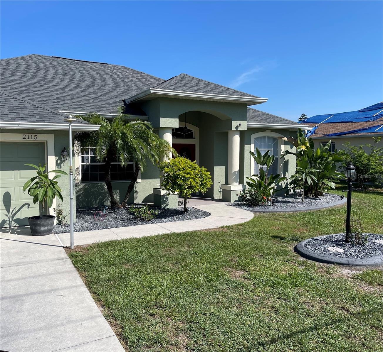 Located in North Port which is one of Florida's most up and coming and fastest growing cities. There is  no HOA or CDD and not in a flood zone! It is also considered one of the most affordable. This Custom Built Beautiful 3 bedroom, 2 bath spacious home features a large kitchen with stone countertops ,an eating space and breakfast bar. This Spacious home has a Family Room, Living Room , Dining Room and a Laundry room. There is a 2 car garage with lots of space. This is a split plan with Primary having an en-suite Bathroom with a shower and garden tub, 2 vanities,2 Walk in Closets and 2 bedrooms on the other side of the home. All Bedrooms have Walk in Closets. There is amazing outdoor space with the guest Bathroom having access to the pool area. The large Lanai has a pool and Spa with room for eating space and chairs. The yard has almost every kind of fruit tree you can imagine. The roof was installed in 2022 , Washer & Dryer are 2 years old, Water heater is 1 year old, and the AC was just installed 3 months ago.  This Beautiful home is move in ready!