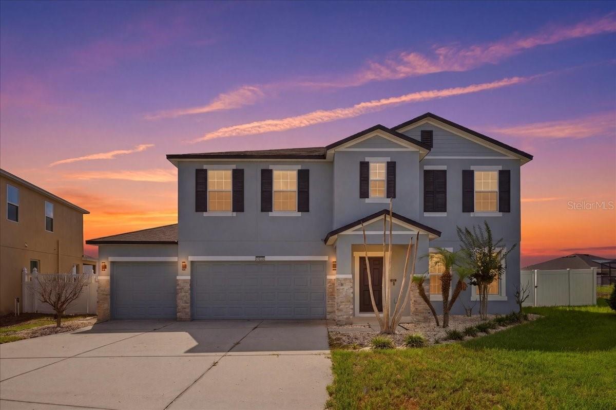 WELCOME HOME! Discover the perfect blend of modern style, spacious living, and peace of mind in this stunning turn-key Haines City gem. Built in 2014 and thoughtfully updated with a brand-new roof in 2024, this beautifully maintained home offers efficiency, comfort, and worry-free living for years to come. Situated on a rare and oversized 0.33-acre lot, the property boasts an expansive backyard with endless possibilities—including plenty of room for a pool, outdoor entertaining, or creating your dream backyard oasis. The highly desirable 3-car garage provides ample space for multiple vehicles, a workshop, hobbies, or additional storage. Step inside to a bright and welcoming foyer that opens to an impressive open-concept floor plan featuring 2,825 square feet of living space and 3,717 square feet under roof. The heart of the home is the spacious chef’s kitchen, complete with abundant counter space, ample cabinetry, and a dedicated dining area perfect for gatherings and everyday living. The flexible 5-bedroom, 2.5-bathroom layout includes a highly sought-after downstairs bedroom with an adjacent half bath, making it ideal for guests, multigenerational living, or a private home office. Upstairs, retreat to the expansive primary suite offering ultimate privacy, a huge walk-in closet, and a luxurious ensuite bathroom designed for relaxation. Enjoy Florida living year-round from the private screened porch overlooking the massive backyard. This exceptional home combines space, functionality, and modern convenience in one incredible package.
