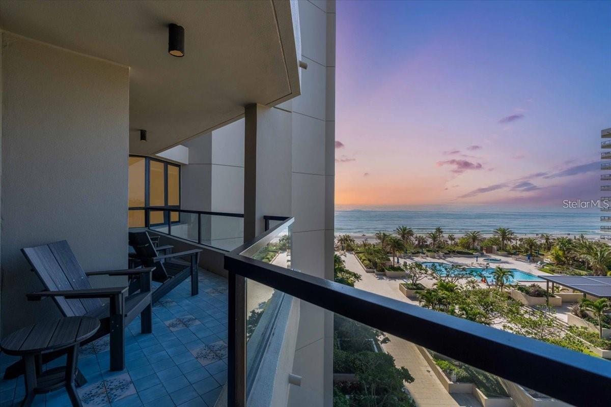 Escape to elegance in this tastefully renovated, fully furnished fourth-floor residence at The Promenade on Longboat Key, where luxury meets effortless coastal living. This spacious two-bedroom, two-bath split-floor-plan condo offers breathtaking sunset views overlooking the Gulf of Mexico and beautifully landscaped community grounds.

Inside, no detail has been overlooked. The residence features Café Series appliances, Quartzite countertops in the kitchen and primary bath, custom cabinetry with a hidden vent hood, and Luminette motorized blinds throughout. Spa-like bathrooms showcase mosaic glass tile showers, rain showerheads, and Delta Premier fixtures, while large-plank luxury vinyl flooring flows seamlessly through the home. Additional highlights include an Electrolux washer and dryer, designer-finished balcony tiles, and impeccably curated furnishings that complete this turnkey offering.

Set on 6.5 acres of Gulf-front paradise, The Promenade delivers an exceptional amenity lifestyle with four Har-Tru tennis courts, a beachfront gazebo, pool and spa, and men’s and women’s health clubs. Residents also enjoy two elegant party rooms, concierge services, an on-site manager, and 24/7 gated security, offering both luxury and peace of mind.

Ideally located on the south end of Longboat Key, this residence is minutes from world-class dining, shopping, cultural venues, and medical facilities. Sarasota-Bradenton International Airport is just 20 minutes away, while Sarasota’s renowned attractions—including St. Armands Circle, The Ringling Museum, and Mote Marine Aquarium are easily accessible.

Whether you seek serene beachfront living or vibrant coastal experiences, this is more than a home it’s a lifestyle. Welcome to your personal paradise at The Promenade.