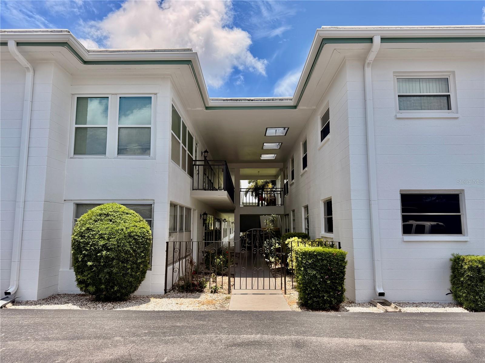 One or more photos have been virtually staged to help buyers envision the full potential of the space. Unit is sold As-Is in current condition. Welcome to Tiffany Gardens — a well-maintained 55+ community in the heart of St. Petersburg! This 1-bedroom, 1-bath first-floor condo offers comfortable, low-maintenance living with an enclosed Florida room perfect for relaxing year-round, plus a convenient exterior storage closet. Fresh interior paint and a brand-new toilet make this unit move-in ready. The HOA fee covers water, sewer, trash, insurance, and exterior maintenance — truly carefree living. Community amenities include a clubhouse, on-site laundry facility, and a beautifully landscaped courtyard with fountain and park-like setting. Conveniently located minutes from Publix, Walmart, Northside Hospital, St. Anthony's Hospital, and vibrant Downtown St. Petersburg. St. Pete-Clearwater International Airport is just a short drive away. 55+ community — at least one occupant must be 55 or older. All information including pet and leasing restrictions to be independently verified by Buyer and Buyer's Agent with the Association prior to closing.