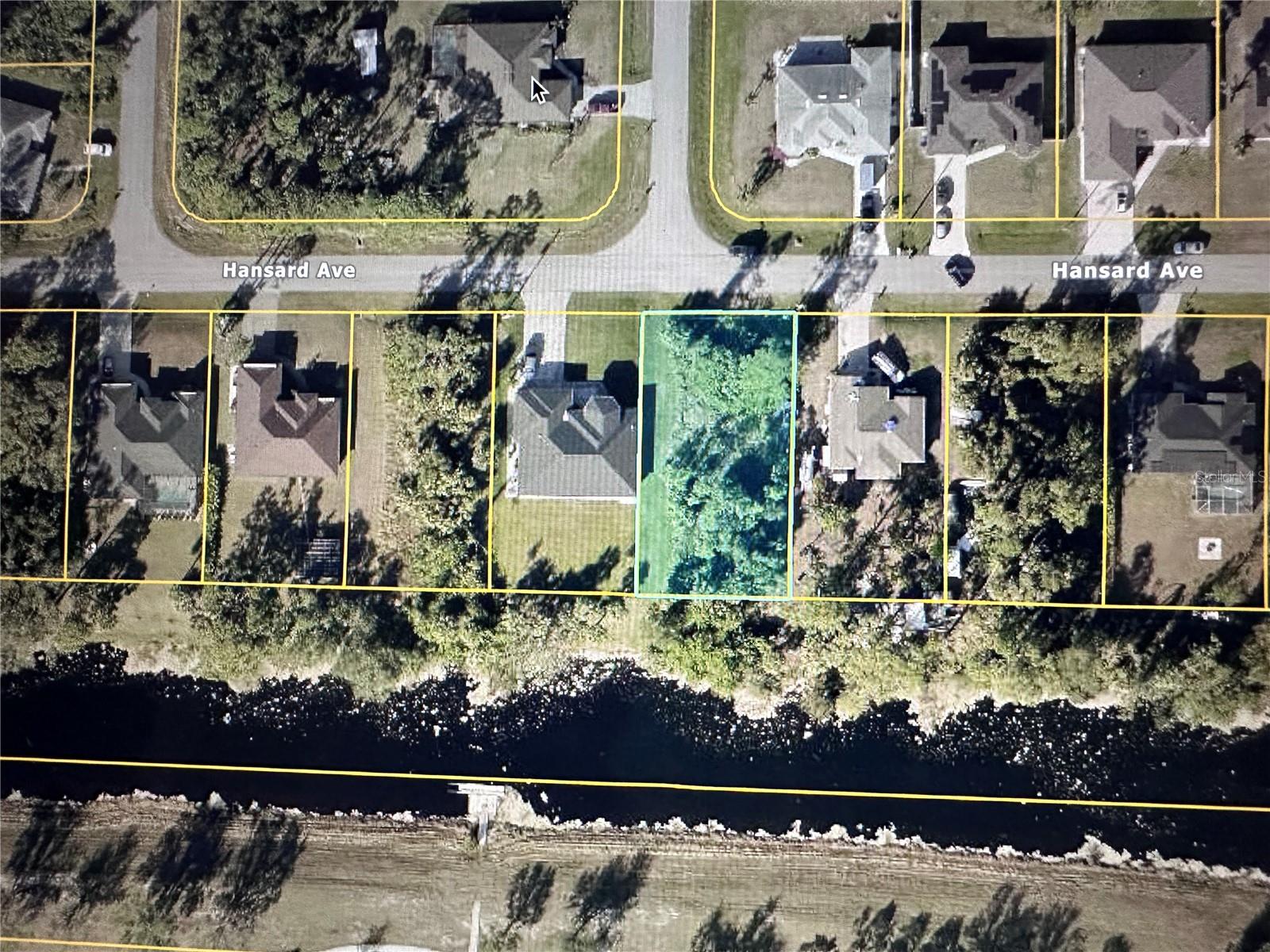 WATERFRONT! NOT IN FLOOD ZONE! (X) Build your dream home on this prime waterfront oversized canal lot in the highly desirable North Port area. Ideally located just minutes from City Hall, the post office, local schools, and the future North Port hospital. This property offers both convenience and long-term value. Enjoy peaceful canal views with the added benefit of being outside of a flood zone, providing extra peace of mind. A perfect opportunity to invest or create your own Florida retreat.