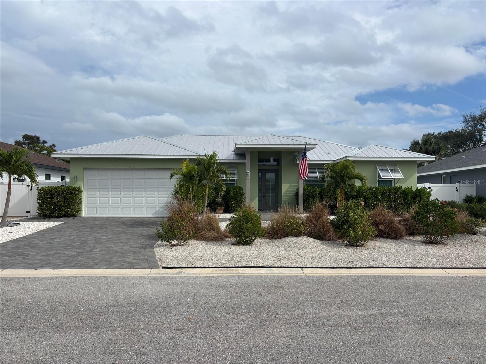 Attention Boaters! This 2021 BUILT, WATERFRONT HOME with DIRECT ACCESS From your private dock to the Manatee River and The Gulf boasts a HEATED POOL, TREX DOCK, and LARGE SCREENED LANAI! Tucked away in the secluded small community of Hidden Lagoon, this property provides a private setting with a protected cove for your boat with a short ride to the Manatee River & The Gulf. You will be joining a small close nit neighborhood with great neighbors, a LOW HOA and NO CDD! An incredible opportunity for the most discerning buyer looking for a newer waterfront home that also provides BACKYARD PRIVACY. There is a large fully screened-in lanai with a panoramic main panel for unobstructed water view and east facing; fully protected from the late day sun. Great for indoor/outdoor living year-round! 

There is an abundance of upgrades and improvements. A lifetime METAL ROOF. Heavy duty impact rated windows and doors (LC-PG55) throughout.  A vinyl privacy fence spans the backyard. Stone pavers cover the driveway, pool deck, patio & covered entryway. Inside, you’ll be welcomed by the open concept floor plan with 10' ceilings and 8’ doors. The kitchen is loaded with desirable finishes including quartz countertops, tile backsplash, shaker cabinets, farm style sink, and stainless-steel appliances. The counter-height island has additional storage cabinets underneath. A spacious centrally located living area boasts a wood plank tray ceiling that matches the driftwood porcelain tile floors throughout. Large glass sliders provide plenty of natural light, spectacular views and make entertaining easy. The spacious Owner's Retreat features French doors to the pool and patio. The generously sized ensuite bath has a private water closet, separate his & her vanities, quartz countertops, overhead lighting. A massive walk-in shower has three heads including two shower heads and a central rain head and tiled floor to ceiling with mosaic tile flooring. Two large walk-in closets complete the suite including a huge 10x8 boudoir! On the opposite side of the house are two guest rooms with plenty of space and large closets. There is a door that separates the guest side of the house, giving your guests complete privacy. Additionally, the back bedroom has a slider offering direct access to the pool & patio. There is also a full guest bath with a bathtub/shower.

The home is centrally located, a short drive to the world renown beaches of Anna Maria Island and Longboat Key, minutes away from downtown Bradenton with plenty of restaurants and shopping close by, has beautiful views, and you will be visited by manatees and other coastal wildlife regularly. From a motivated seller. This is a rare gem!