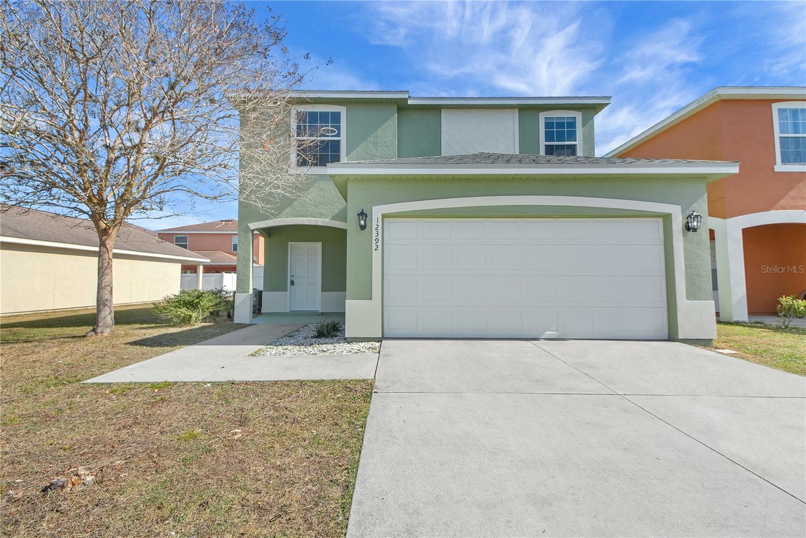 NEED SPACE?! Is your family growing? With 4 bedrooms, 3 and a half bathrooms this home is your perfect fit! Walk into brand new Luxury Vinyl Plank flooring throughout the downstairs, large  Living/Dining rooms with a combined space for flexibility! Fresh paint! The Kitchen offers a breakfast bar, an abundance of counter space and cabinetry. Side by side refrigerator, Large double door pantry closet and a Stainless Steel farm sink! There is a half bath downstairs for convenience. Upstairs you will discover laminate flooring throughout, the laundry closet with a washer and dryer! Four bedrooms and three bathrooms! New lights with fans and spacious rooms. The Primary suite has a huge walk in closet and a private bath with double vanity, private water closet and an oversized tiled shower.  The backyard is private and ready for a barbeque enclosed by a vinyl privacy fence. This home offers a large open but covered patio in the back and small covered patio in the front. It features a two car garage. The community is family friendly and is loaded with amenities. Just to mention a few, a community pool, club house, playground, tennis courts and so much more! Here are some important dates, Roof 2025, HVAC and HWH 2013. This is a great opportunity to own in a community that is close to shopping, restaurants and easy access to CR 466.