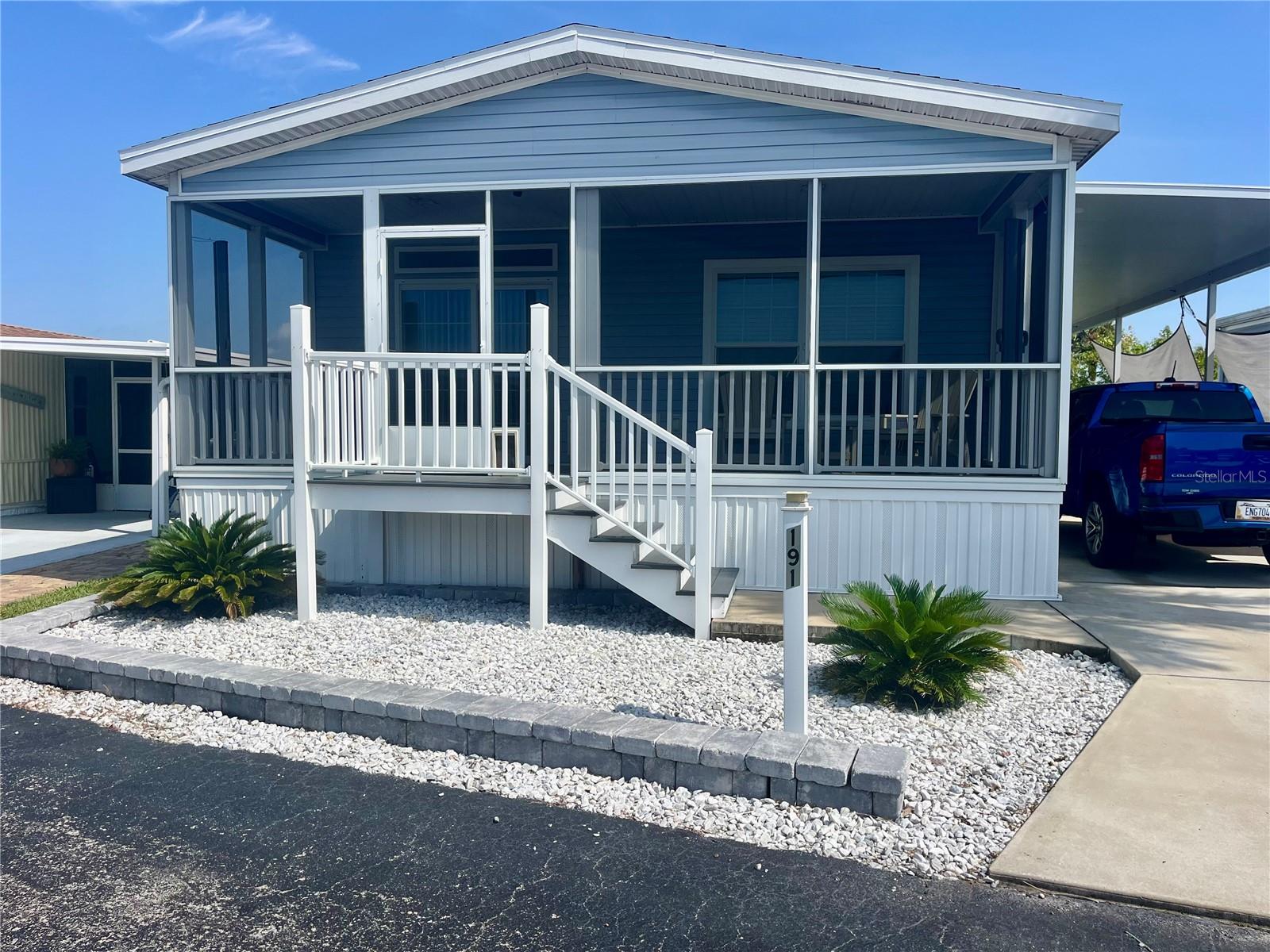 Imagine living your best summer every single day in this stunning, nearly-new Key West-style getaway! Built in 2022, this elevated Skyline Silver Springs Series home offers a view of the Intracoastal Waterway right from your own screened-in front porch. Picture yourself relaxing in the gentle cross-breeze, watching boats glide by and soaking in spectacular sunsets every evening without ever having to leave home.This home was built to the highest coastal standards (Wind Zone III, Exposure D) and features a gorgeous, wide-open floor plan that is absolutely perfect for entertaining. You will love the modern touches, including:
 - Chef’s Kitchen: Beautiful soft-close cabinetry, stainless steel appliances, and high ceilings.
  - Luxury Finishes: Durable vinyl plank flooring, crown molding, and neutral designer paint throughout.
  - Flexible Space: 2 spacious bedrooms and 2 baths, plus a private bonus Den with French doors—perfect for a beachside home office.
  - Convenience: A covered tall carport for large vehicles and a 10x14 storage shed for all your beach gear.Located in the highly coveted Surfside Estates, this is a premier 55+ resident-owned community nestled perfectly between the Atlantic Ocean and the Intracoastal. Best of all? There is no lot rent! Your purchase includes a share of the land, and the low $220/month maintenance fee covers Wi-Fi, cable, and yard care.The lifestyle here is unmatched. You can walk to the beach across the street or take your golf cart down to the community docks for morning coffee and fishing. Enjoy the heated/cooled pool, fitness room, and a rooftop deck that provides a front-row seat for fireworks and space launches. Whether it’s Friday night bingo, water aerobics, or kayaking, there is always something to do.With the charming shops of Flagler Beach just minutes away, this is the beachside dream you’ve been waiting for. Prepare to be wowed—schedule your appointment today to see this special community for yourself!