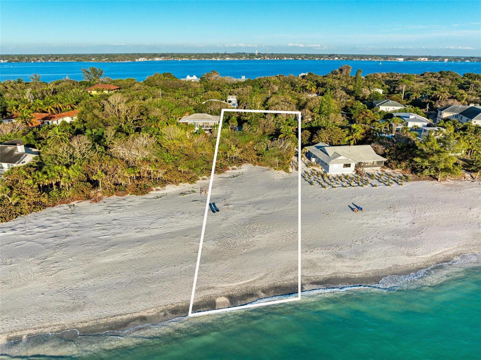 *Price has just been reduced by $770,000* With over 100 feet of pristine Gulf Front beach, this private beachfront lot offers unparalleled access to one of the widest stretches of sand on Manasota Key. Design and build your custom Gulf front home and experience the pinnacle of private island living. This parcel is situated on the exclusive Sarasota side of Manasota Key, where you can stroll for miles along a private beach and enjoy breathtaking sunsets and Gulf views.
Conveniently close to the vibrant restaurants, bars, and entertainment on the Charlotte County side of the island and just 15 minutes from major retail and dining options off-island.
Access to the property is a breeze, with major airports located within an hour's drive.
Don't miss the chance to design your personal slice of paradise on this stunning beachfront lot. Welcome to the true meaning of tropical island life!