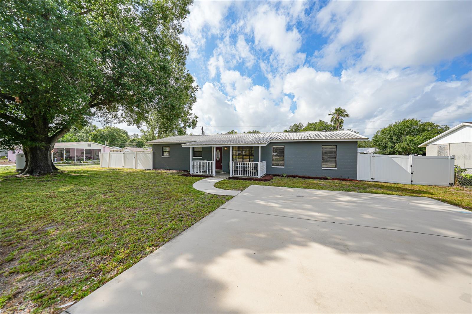 Some homes just feel comfortable the second you pull into the driveway… and this one absolutely does. This solid concrete block, 4 bedroom, 2 bathroom home checks so many boxes with its durable metal roof, split bedroom floor plan, tile flooring throughout, and a layout that simply works for real life. The primary suite is oversized and tucked away for privacy with a large walk-in closet and plenty of room to truly spread out. Right in the heart of the home, the kitchen keeps everyone connected with tons of countertop space for meal prepping, homework sessions, holiday baking, or hosting friends on game day. Step outside and you’ll find a fully privacy fenced backyard that’s ready for pets, playtime, backyard barbecues, or simply enjoying your own little slice of peace and quiet. There’s even a storage shed for all the extras. And the curb appeal? So good. A sprawling shade tree anchors the front yard and practically begs for a picnic table underneath it, while the front porch feels made for sweet tea sipping and slow evenings. Located just minutes from everything we love about Arcadia including local schools, charming antique shopping, cozy cafés, and the beloved local bookstore, this home offers comfort, convenience, and that small-town Florida lifestyle people are constantly searching for.
