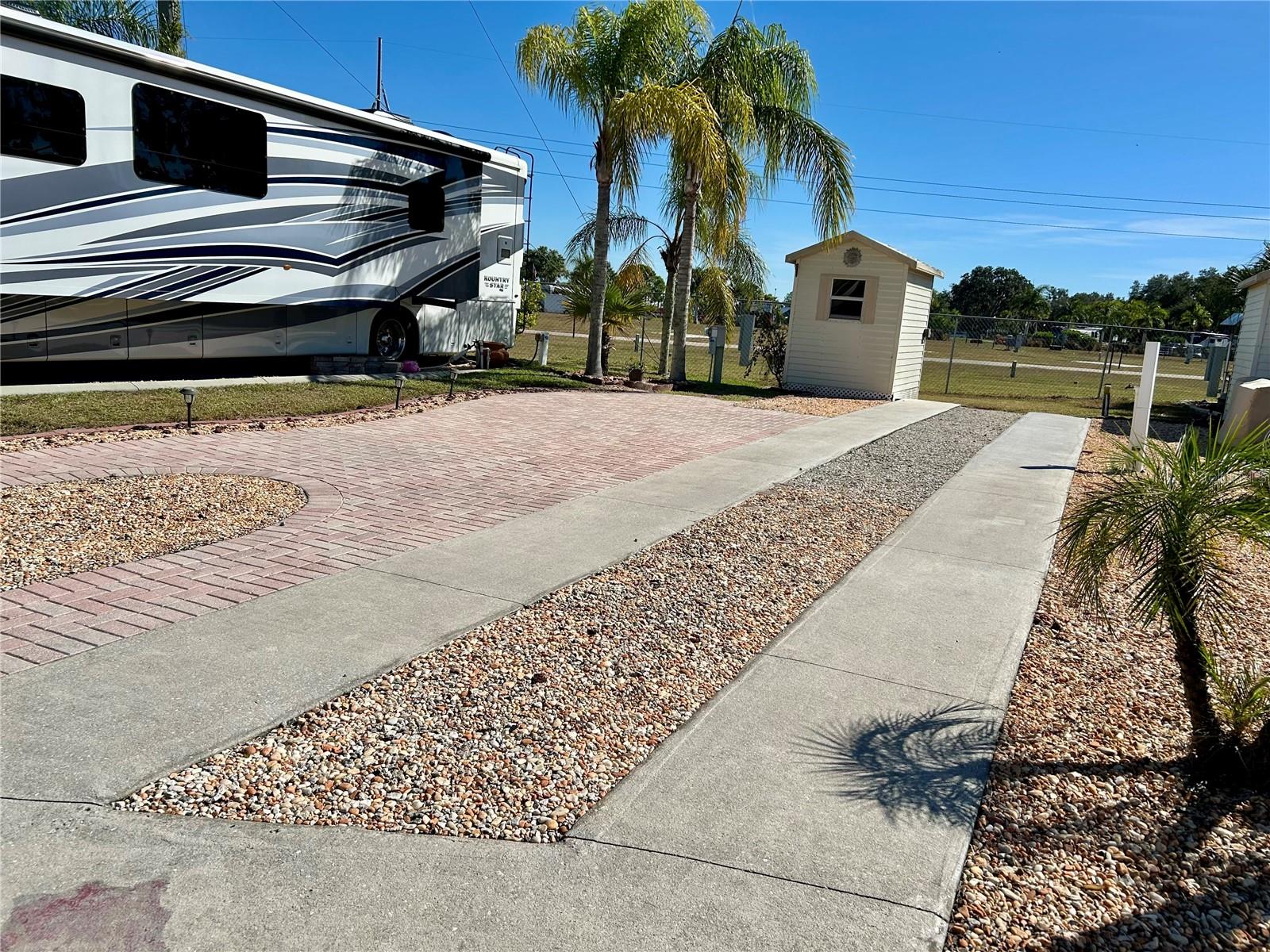 Welcome to Torrey Oaks RV & Golf Resort — a lively 55+ RV community nestled in the heart of Central Florida!  This spacious lot accommodates either a Class A motorhome or a Fifth Wheel, with both 30-amp and 50-amp hookups available. A storage shed is included for added convenience.  Residents enjoy an active, social lifestyle with a wide range of amenities and activities, including a swimming pool, pickleball and shuffleboard courts, fitness center, pool hall, bingo, karaoke, dancing, arts and crafts, card games, and tournaments.  You’ll also find a fenced dog park for your four-legged family members and a catch-and-release fishing pond for a relaxing afternoon by the water.  The HOA fee is $130/month, covering water, sewer, trash pickup, and full access to all amenities. There is also a $45 annual sewer fee.