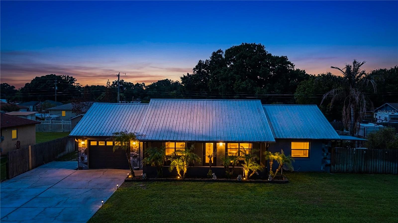 Welcome home! This prime North Lakeland property, located just off Duff Rd, offers an impressive combination of modern upgrades, flexible living space, and exceptional outdoor entertaining areas, making this property truly one-of-a-kind. Inside, you'll find a spacious open-concept floor plan featuring luxury vinyl flooring, updated lighting, and a stunning kitchen with abundant cabinetry, stainless steel appliances, expansive granite countertops, and an oversized island perfect for gathering with family and friends. 
The home offers 3 bedrooms, & an additional Bonus room, providing room for guests, hobbies, a home office, or Multi-Generational living. 

Major updates have already been completed, giving buyers peace of mind for years to come, including a newer metal roof (2019), HVAC system (2019), upgraded electrical panel (2024), new electric water heater, new drain field, and spray foam insulation in both the home and detached shed for improved energy efficiency. 
Step outside and discover what truly sets this property apart. Designed for entertaining, the backyard features a massive covered pavilion with concrete flooring, ample space for outdoor dining and gatherings, a detached storage shed, and a custom tiki-style bar area perfect for hosting cookouts, game days, and weekend get-togethers. The garage is equipped with its own mini-split system, creating the perfect workshop, gym, hobby room, or climate-controlled flex space.
With no HOA, no CDD fees, and a convenient location near shopping, dining, schools, and major commuter routes, this move-in-ready property offers the freedom, upgrades, and entertaining space that today's buyers are searching for.