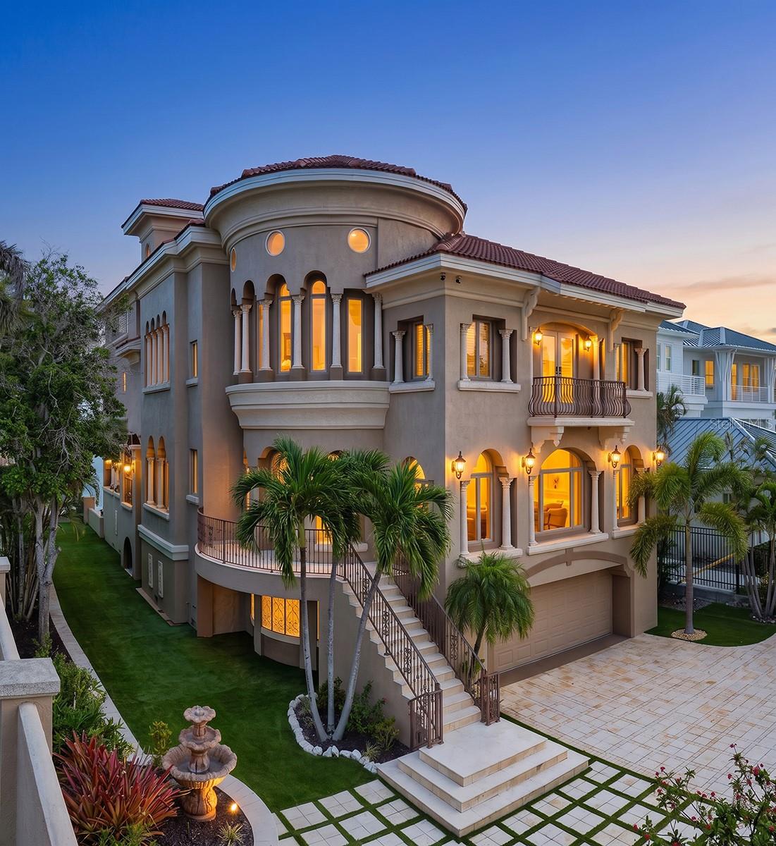 A boater's dream and RARE opportunity—One of just 39 homes on this EXCLUSIVE side of St. Armands Circle offering -DIRECT GULF ACCESS- NO FIXED BRIDGES - and NO OBSTACLES. True deep-water dockage that comfortably accommodates a vessel over 60 feet.
Enjoy full waterfront views of Sarasota Bay and the iconic downtown Sarasota skyline from every north-facing room in this home.
This stunning, gated waterfront estate showcases the timeless elegance of Mediterranean architecture, blending classical design with refined coastal living. Expertly engineered with solid poured concrete walls reinforced by structural steel beams, this residence offers unmatched strength, integrity, and long-term value—an ideal foundation for both luxury and peace of mind.
This Venetian-inspired estate is a rare architectural masterpiece, showcasing meticulously hand-applied Venetian plaster walls that exude artisan-crafted elegance—both refined and truly one-of-a-kind. The home features unmatched fit and finish throughout the entire residence.
The primary floor of this home is thoughtfully designed for seamless living and exceptional entertaining value.
Take in full waterfront views of Sarasota Bay and the downtown skyline while preparing a meal in the master-crafted kitchen or relaxing on the expansive waterfront veranda. 
The kitchen is an authentic showpiece and a true chef’s dream, featuring professional-grade appliances, a robust gas range with multiple burners, hand-carved cabinetry, and marble flooring throughout.
This four-story home is equipped with a whole-house elevator for effortless access to each level.
With an expansive extended garage, it’s ideal for car enthusiasts, offering multiple storage bays and additional space for organization.
Looking for ease of maintenance? Enjoy the recently installed, top-of-the-line polymer turf surrounding the home. The luxury pool and spa features all brand new equipment and water heater, a premium-grade saltwater chlorination system, complete with full automation and water features. Delivering crystal-clear water and low-maintenance convenience. 
St. Armands Circle is one of Sarasota’s most coveted and prestigious addresses. This home's premier location places you just steps from Lido Beach. Frequent festivals, classic car shows, and seasonal events make the area lively year-round. Choose from gourmet restaurants, boutique shops, and family-friendly activities as you stroll the Circle. Downtown Sarasota’s theaters, museums, and fine arts venues are just a short drive away.
For golf enthusiasts, this home is minutes from The Longboat Key Club—one of Sarasota’s most prestigious private clubs. The club features 45 holes of championship golf across two beautifully maintained courses and a full-service, resort-style experience including a world-class tennis center, private beach, deepwater marina slips, full-service spa, upscale dining, and an active calendar of social events.