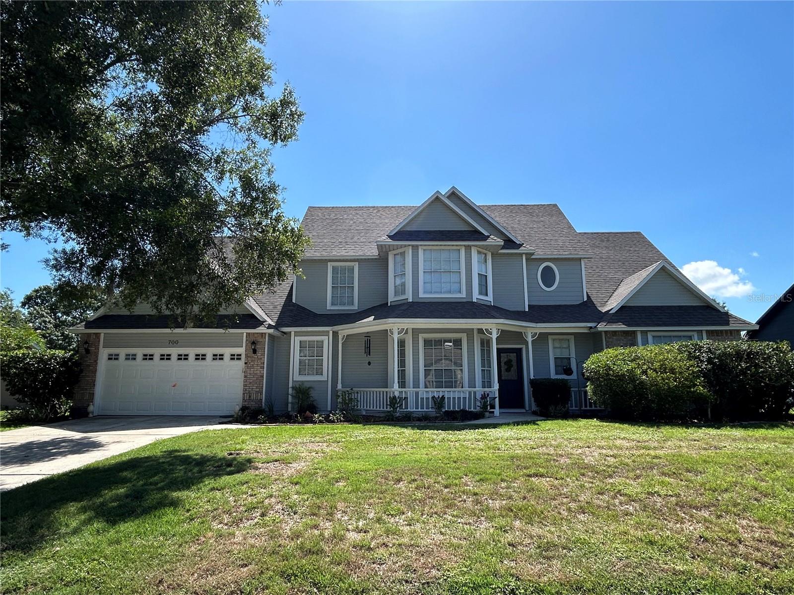 Welcome to the beautiful community of Adriane Park.  With large lots and only 54 homes, they just don't make neighborhoods like this one any more.  This home sits on over 1/3 of an acre and overlooks the beautiful pond with a fountain.  The home itself is absolutely gorgeous, with exquisite curb appeal with brick overlays and hardy board siding.  The roof was replaced in December of 2024.  The main living and dining area have hardwood floors and there is crown moulding throughout the downstairs.  The living room has a wood burning fireplace.  The kitchen has ceramic tile, stainless steel appliances and Schrock handcrafted pecan wood cabinetry.  The primary bedroom is downstairs with it's own private bathroom, as well as another half bathroom downstairs.  Indoor laundry is located downstairs next to the half bath.  Upstairs there are 4 more spacious bedrooms, all with walk-in closets!  The fifth bedroom has double doors and dual walk-in closets and can be used as a flex space, or upstairs living area.  The Florida Room is huge with ceramic tile and is air conditioned through the main unit and also offers a mini split HVAC unit.  It leads out to the beautiful screened in pool area that is perfect for entertaining, with landscaping and an electric above ground hot tub.  The pool overlooks the neighborhood pond, which also means no rear neighbors.  This home is ready to be the focal point of all of your family gatherings!