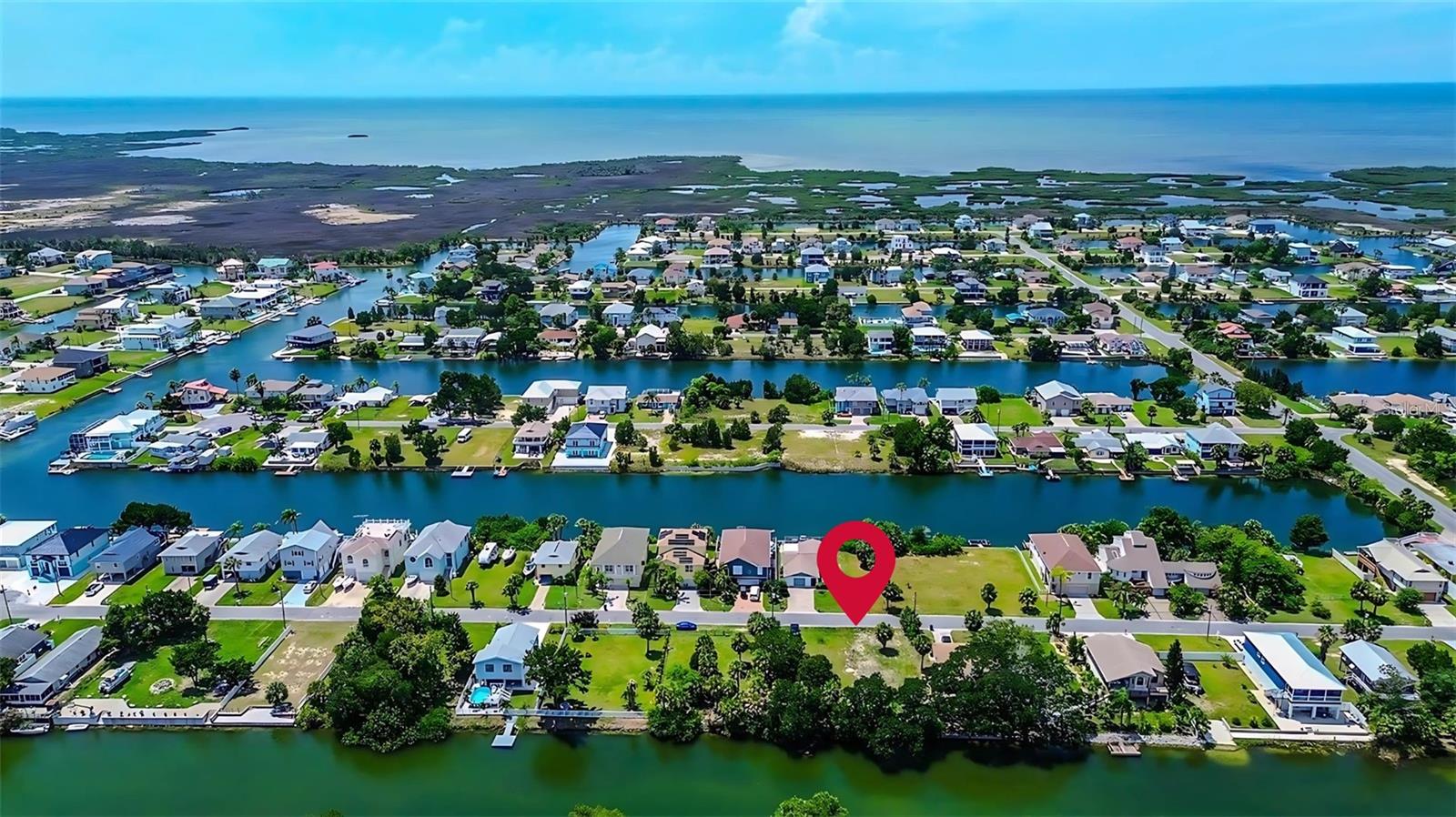 Build your coastal dream on this rare 0.11-acre canal-front lot (approx. 50x100 ft) in a peaceful waterfront setting. Enjoy indirect Gulf access via a saltwater canal and boat lift, perfect for boating, kayaking, or paddleboarding. Zoned PDP, this level, buildable lot offers design flexibility and is located in Flood Zone AE, ideal for elevated construction to take in water views and breezes. With no HOA, nearby utilities, and paved road access, this is the perfect spot for a weekend getaway or year-round retreat!