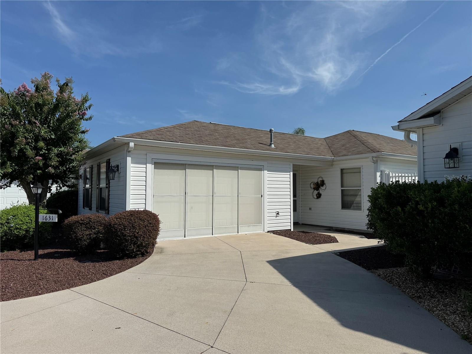 Nestled in the desirable Village of Poinciana (Mount Pleasant Villas), this beautifully maintained Bonita Key Series 2/2 courtyard villa offers an unbeatable location between Lake Sumter Landing and Brownwood Paddock Square. Whether you’re a snowbird searching for your first Villages home or a current Villager wanting to be in the heart of Florida’s Friendliest Hometown, this villa may be the perfect fit.  
Step inside to an inviting open floor plan with vaulted ceilings that enhance the spacious feel. This home is TURNKEY, featuring tasteful furnishings that create a warm, comfortable environment for relaxing or entertaining. The kitchen includes a gas range, abundant cabinetry, a pantry closet, and a welcoming breakfast bar where guests naturally gather.  The master bedroom offers an ensuite bath with shower, while the Florida room opens to a private courtyard patio—ideal for morning coffee or evening unwinding. Low-maintenance landscaping means NO lawn mowing, giving you more time to enjoy the lifestyle.  Interior finishes include engineered hardwood flooring in the main living areas, carpet in the bedrooms, and tile in the bathrooms. Major updates add tremendous value:  Roof – 2025, New Washer & Dryer – 2025, New Ceiling Fans – 2026, Water Heater – 2026, an 18-year-old 4-seater golf cart is included—an excellent bonus for exploring all The Villages has to offer.  With its low bond, turnkey convenience, and prime location, this villa delivers comfort, style, and effortless living in one of Poinciana’s most sought-after neighborhoods.