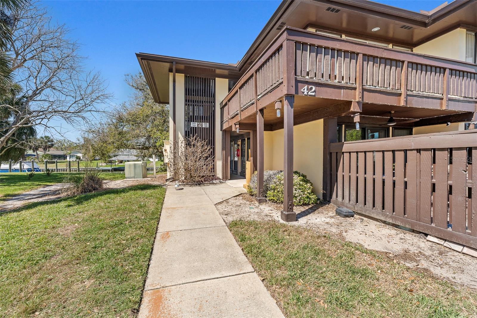 Watch the boats, dolphins, & manatees float by from this private ground floor corner unit, water views from 4 rooms! An open patio off the living room & a screened patio off the master bedroom where you'll also enjoy 3 closets: linen, wall & walk-in! Across the street is Palm Harbor Golf Course where you’ll find Loopers Par & Grille just under a mile away! European Village is just over a mile away where you’ll enjoy restaurants and shopping. AC is approximately 6 years young, new roof in September of 2023, freshly painted, LVT waterproof plank flooring. Beautiful grounds, BBQ's throughout, Clubhouse and walking paths. HOA fees include Cable, internet, water, trash, ground and pool maintenance. Call for your private tour today!
